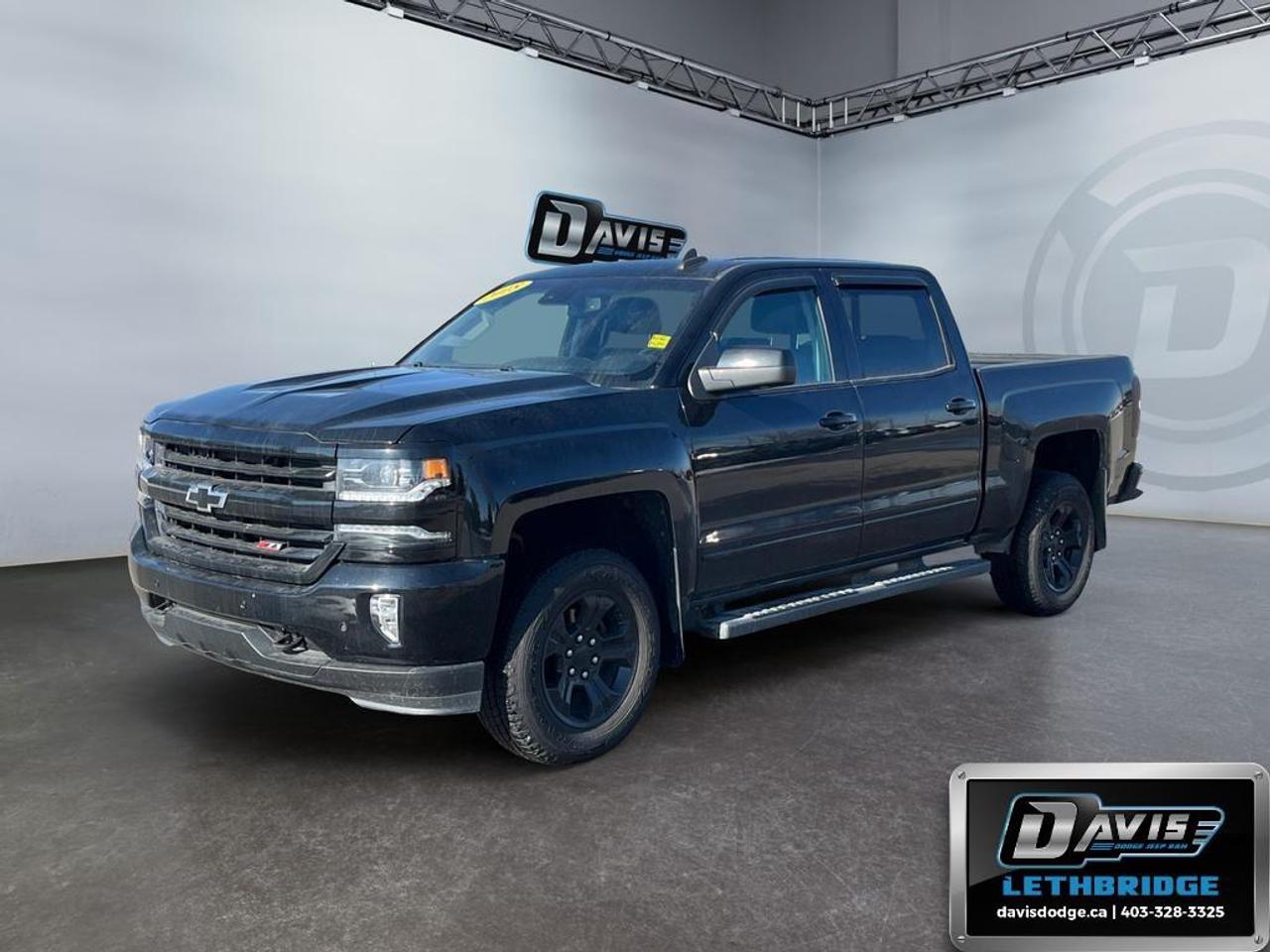 <b>Leather Seats, Heated Seats, Remote Start, Aluminum Wheels, Driver Seat Memory, <br /> <br /></b><br /> The 2018 Chevrolet Silverado 1500 LTZ combines rugged capability with refined comfort, making it the perfect full-size pickup for work and everyday driving. Powered by a 6.2L V8 engine and 8-speed automatic transmission, this Silverado offers impressive towing and hauling capacity, enhanced by 4WD, StabiliTrak electronic stability control, and hill start assist. Its bold design features LED daytime running lights, chrome accents, corner-step rear bumper, and a spray-in bedliner with cargo tie-downs.<br /><br />Inside, the LTZ cabin delivers premium comfort with leather-appointed seats, heated front seats, power-adjustable driver and passenger seating, dual-zone climate control, and a Chevrolet Infotainment 3 system with 8-inch touchscreen. Apple CarPlay, Android Auto, Bluetooth audio streaming, and multiple USB ports keep you connected, while the rear 60/40 folding bench and rear air vents provide space and convenience for passengers.<br /><br />Safety comes standard with rear vision camera, forward collision alert, lane departure warning, trailer sway control, and Teen Driver mode. Optional features like remote start, power-sliding rear window, and integrated trailer brake controller further enhance capability. With its blend of strength, technology, and comfort, the 2018 Chevrolet Silverado 1500 LTZ is ready for any job or adventure.<br /> <br />To apply right now for financing use this link: <a href=https://lethbridge.davisdodge.ca/free-credit-check/ target=_blank rel=nofollow noopener noreferrer>https://lethbridge.davisdodge.ca/free-credit-check/</a><br /> <br /><br />Locally Owned & Trusted for Over 35 Years  Davis Dodge in Lethbridge, AB <br /><br /> At Davis Dodge, weve proudly served the Lethbridge community for more than 35 years, offering an unparalleled car buying experience. Dont just take our word for itour Google reviews speak volumes about our commitment to exceptional service. <br /><br /> Delivery & At-Home Test Drives: Convenient options to suit your lifestyle. <br /><br /> Flexible Financing for Everyone: Get the vehicle you need with financing solutions tailored to your situation. <br /><br /> Full Mechanical Inspections & Professional Cleaning: Every vehicle is thoroughly inspected and cleaned before it hits our lot.<br /><br /> We take all makes and models on trade and offer competitive pricing with inventory that changes daily. Whether you're shopping for a Chrysler, Dodge, Jeep, RAM, or FIAT, our AMVIC Licensed dealership makes it easy to browse, buy, and drive away.<br /><br /> Located in Lethbridge, AB, we proudly serve customers in Fort Macleod, Taber, Claresholm, and Coaldale. Shop online or visit us today to experience the best in sales, service, and selection. Standard bank rates apply; taxes are additional.<br /><br /> Vehicle pricing offer shown expires 2026-06-30. <br /> Come by and check out our fleet of 50+ used cars and trucks and 110+ new cars and trucks for sale in Lethbridge. o~o