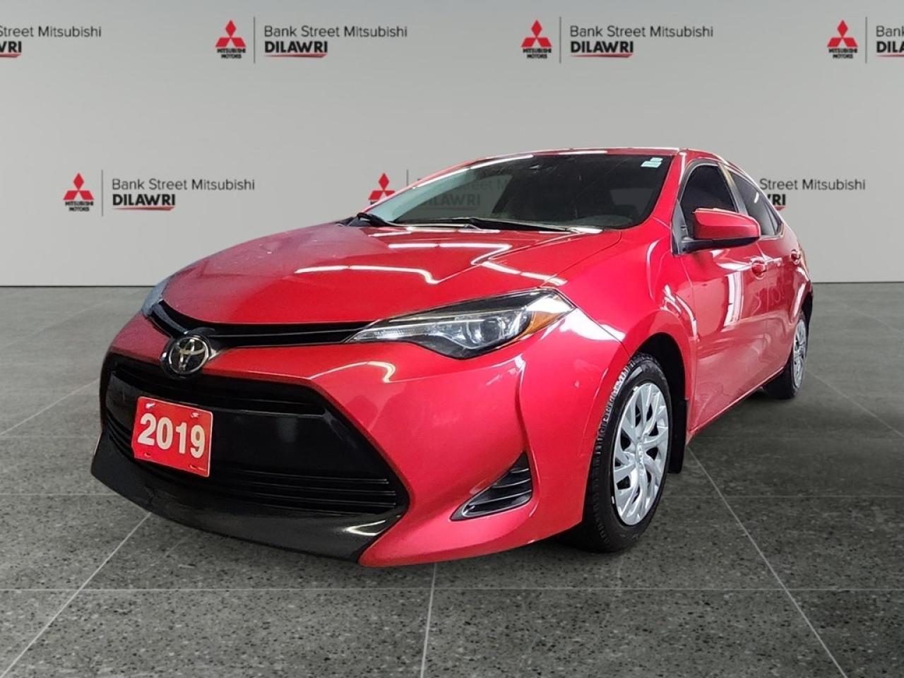 Balance of 5 year/100,000kms BASIC warranty and 10 year/160,000kms Factory Powertrain Warranty on ALL MITSUBISHI products! Best in the industry!!!! The 2019 Toyota Corolla LE CVT in vibrant red with a sleek front-wheel drive system is designed to offer smooth handling and efficient performance. This sedan presents a classic and stylish exterior that will turn heads at every corner. Step inside and experience the comfortable interior equipped with modern features. From the convenience of power windows to the seamless connectivity offered by the Bluetooth connection, every drive becomes enjoyable. With its automatic transmission, this vehicle ensures effortless control and a relaxing driving experience. Safety is paramount in this Corolla, with key features like a backup camera for easier parking, brake assist for enhanced stopping power, and lane assist to keep you confidently on track. The inclusion of cruise control simplifies long journeys, ensuring comfort and ease on every excursion. This vehicle is ideal for individuals and families looking for reliable transportation with advanced tech and safety features. Contact our dealership today for more information and make the 2019 Toyota Corolla your trustworthy road companion.