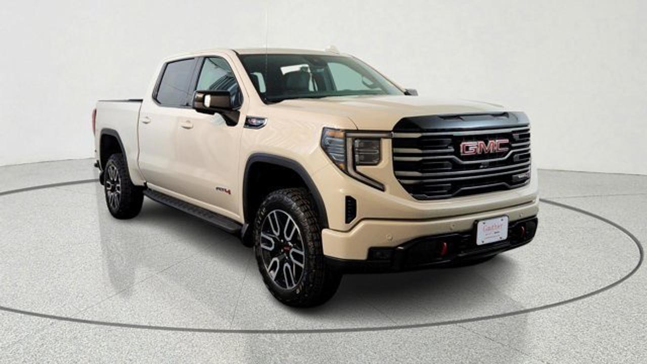 The 2026 GMC Sierra 1500 AT4 brings a serious dose of off-road capability to the full-sized pickup segment, featuring a factory-installed 2-inch suspension lift with off-road tuned components and Rancho monotube shocks. Under the hood it pairs the rugged 6.2 litre engine with a 10-speed automatic transmission. Inside, the cabin features premium touches like perforated leather front seats in Jet Black with Kalahari accents, and a 13.4-inch touchscreen infotainment system with Google Built-In.