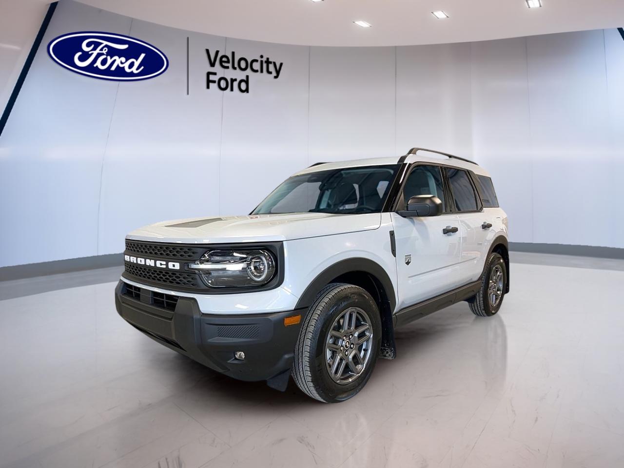 Meet the brand new 2026 Ford Bronco Sport Big Bend 4x4, now at Velocity Ford in Moose Jaw. Finished in clean White with a Brown interior, this 4-door SUV is built for drivers who want everyday comfort with real all-weather confidence. Its 1.5-litre gas engine and smooth 8-speed automatic transmission make it easy to enjoy city errands, highway commutes, and weekend escapes with the sure-footed grip of four-wheel drive.

The 2026 Ford Bronco Sport Big Bend 4x4 keeps life simple in the best way. Push-button start gets you moving fast, while automatic headlights and LED headlamps help you see clearly when prairie weather turns. Inside, youll appreciate the calm feel of automatic climate control, plus heated front seats for cold mornings. Tinted windows add comfort and privacy, and ambient lighting brings a modern touch after dark.

ADVANCED SAFETY FEATURES  
»» Anti-lock braking system for controlled stops  
»» Stability control for confident cornering  
»» Blind spot monitor for safer lane changes  
»» Lane departure warning helps keep centered  

PERFORMANCE AND EFFICIENCY  
»» 1.5-litre gas engine for daily driving  
»» Four-wheel drive for all-weather traction  
»» 8-speed automatic transmission shifts smoothly  
»» Power steering for easy low-speed control  

COMFORT AND CONVENIENCE  
»» Automatic climate control maintains cabin comfort  
»» Heated front seats for winter commutes  
»» Drivers seat lumbar support reduces fatigue  
»» Power windows for quick one-touch airflow  

TECHNONOLGY AND CONNECTIVITY  
»» Bluetooth integration for hands-free calling  
»» Steering wheel audio controls within reach  
»» Satellite radio for more listening choice  
»» WiFi hotspot keeps devices connected  

CARGO SPACE  
»» Rear trunk access makes loading simple  
»» Four-door layout eases passenger entry  
»» Practical cargo area for daily gear  
»» Flexible space for weekend essentials  

WHAT OTHER OWNERS LIKE  
»» Confident visibility from SUV seating position  
»» Easy-to-use controls and clear features  
»» Helpful driver aids for busy traffic  
»» Heated seats for cold-weather comfort  

From school runs to road trips, this brand new 2026 Ford Bronco Sport Big Bend 4x4 delivers the features youll use every day: a backup camera for easier parking, heated mirrors with electric mirror adjustment, and a full set of airbags including side impact and head side airbags. Child safety locks and a tire pressure monitoring system add extra peace of mind for family driving.

This 2026 Ford Bronco Sport Big Bend 4x4s VIN is: 3FMCR9BN5TRE09966.