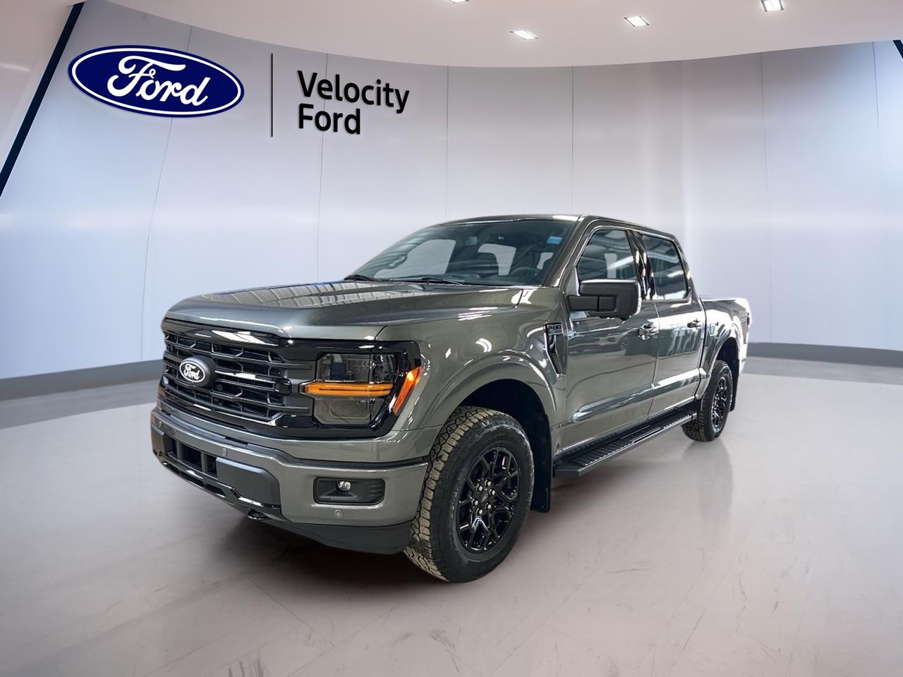 Meet the brand new 2026 Ford F-150 XLT SuperCrew at Velocity Ford in Moose Jaw, finished in a clean Grey exterior with a Black interior and 4 full-size doors for easy access. With its 2.7 L gas engine, automatic transmission, and confident 4-wheel drive, this truck is built for real Saskatchewan workdays and relaxed weekend miles.

The 2026 Ford F-150 XLT SuperCrew is ready for towing and hauling with a rated towing capacity of 4,671 kg. Add in off-road tires, fog lights, and LED headlamps, and you get a truck that feels prepared when the weather turns or the road ends. It also keeps daily driving simple with cruise control, power steering, and a backup camera for stress-free parking.

TRUCK FEATURES  
»» Towing capacity rated at 4,671 kg  
»» Four-wheel drive for tough conditions  
»» Rear tow hook for recovery help  
»» Off-road tires for added traction  

ADVANCED SAFETY FEATURES  
»» Anti-lock braking system helps maintain control  
»» Stability control supports confident handling  
»» Side impact airbags add occupant protection  
»» Lane departure warning alerts inattentive moments  

PERFORMANCE AND EFFICIENCY  
»» 2.7 L gas engine for capability  
»» Automatic transmission for smooth shifting  
»» Dual shift mode for manual control  
»» Power steering for easy low-speed turns  

COMFORT AND CONVENIENCE  
»» Front air conditioning for cabin comfort  
»» Power windows for quick ventilation  
»» Adjustable steering wheel for better fit  
»» Driver lumbar support reduces fatigue  

TECHNONOLGY AND CONNECTIVITY  
»» Bluetooth integration for hands-free calling  
»» WiFi hotspot helps keep devices connected  
»» Satellite radio for more listening choice  
»» Steering wheel audio controls add convenience  

CARGO SPACE  
»» Rear trunk access for easier loading  
»» Spare tire included for roadside readiness  
»» Tinted windows help reduce cabin glare  
»» Automatic door locks add daily ease  

WHAT OTHER OWNERS LIKE  
»» Strong towing confidence for trailers and toys  
»» Easy-to-use driver-assist safety alerts  
»» Smooth ride with automatic transmission  
»» Useful connectivity like Bluetooth and WiFi  

This 2026 Ford F-150 XLT SuperCrews VIN is: 1FTEW3LP7TKD29365.