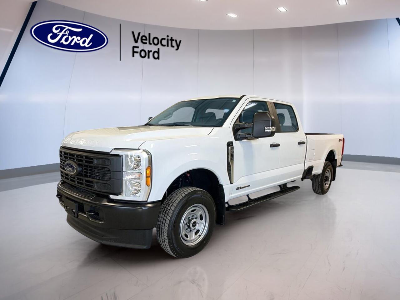 Built for serious work and long days on the road, this brand new 2026 Ford Super Duty F-350 SRW XL Crew Cab is ready for Moose Jaw drivers who need real capability. Finished in White with a Dark grey interior, it brings a clean, professional look to the jobsite. With a 6.7 L diesel engine, automatic transmission, and 4WD, its set up for confident hauling in all seasons.

This 2026 Ford Super Duty F-350 SRW XL Crew Cab is designed to make tough tasks feel routine. You get a strong towing rating of 6,213 kg, plus key tools like a limited slip differential and a rear tow hook to help you stay in control when traction and load matter most. It also includes a spare tire and steel wheels for practical durability.

TRUCK FEATURES  
»» 6,213 kg towing capacity for heavy loads  
»» Four-wheel drive for year-round traction  
»» Limited slip differential for better grip  
»» Rear tow hook for recovery support  

ADVANCED SAFETY FEATURES  
»» Anti-lock braking system for controlled stops  
»» Stability control helps maintain steady handling  
»» Driver and passenger airbags included  
»» Side impact and head airbags protection  

PERFORMANCE AND EFFICIENCY  
»» 6.7 L diesel engine for torque  
»» Automatic transmission for smooth power delivery  
»» Dual shift mode for manual control  
»» Power steering for easier low-speed maneuvers  

COMFORT AND CONVENIENCE  
»» Front air conditioning for cabin comfort  
»» Cruise control reduces highway driving fatigue  
»» Power windows for quick adjustments  
»» Driver lumbar support for longer drives  

TECHNONOLGY AND CONNECTIVITY  
»» Backup camera for easier reversing  
»» Bluetooth integration for hands-free calling  
»» Steering wheel audio controls within reach  
»» WiFi hotspot support for connected travel  

CARGO SPACE  
»» Crew Cab with four full doors  
»» Rear trunk access for added utility  
»» Practical interior storage for daily gear  
»» Space to support workday essentials  

WHAT OTHER OWNERS LIKE  
»» Confident towing and hauling under load  
»» Diesel torque for steady pulling power  
»» Four-wheel drive capability in bad weather  
»» Backup camera for easier hitching  

This brand new truck is sold by Velocity Ford in Moose Jaw, and its equipped with the core features many hard-working owners ask for most: proven diesel power, 4WD confidence, and smart essentials like a backup camera, Bluetooth, and stability control. Its a straightforward Super Duty built to show up, day after day.

This 2026 Ford Super Duty F-350 SRW XL Crew Cabs VIN is: 1FT8W3BT0TED65697.