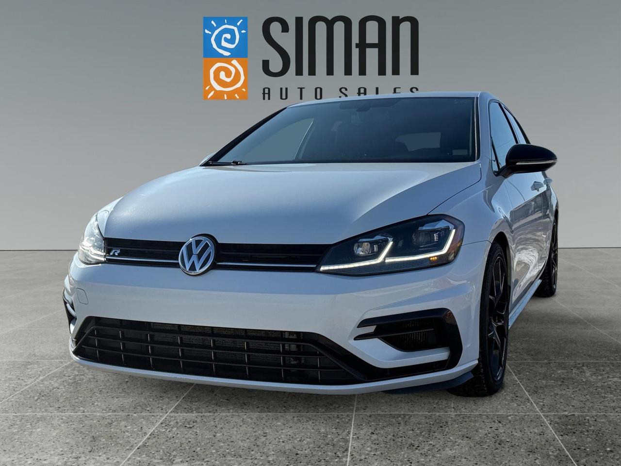 2018 VOLKSWAGEN GOLF R - THE ULTIMATE PERFORMANCE HATCHBACK

Experience the gold standard of hot hatches. This 2018 Volkswagen Golf R offers breathtaking speed and precision without sacrificing daily-driver luxury. It is the perfect blend of track-ready power and premium comfort.

PERFORMANCE AND AGILITY

This Golf R is built for those who love to drive:

* Only 94,000 kilometers on the clock.
* 292 Horsepower 2.0L Turbocharged engine.
* Lightning-fast 7-speed automatic transmission with steering wheel paddle shifters.
* 4MOTION All-Wheel Drive system ensures you are glued to the road in any Saskatchewan season.

PREMIUM FEATURES AND TECHNOLOGY

Step into a cabin designed for the enthusiast:

* Fender Premium Audio System for crystal-clear, powerful sound.
* 8-inch touchscreen with Navigation and Bluetooth connectivity.
* SiriusXM Radio and a high-definition Back-Up Camera.
* Power heated leather sport seats for maximum comfort.

THE SIMAN AUTO SALES COMMITMENT

We have meticulously vetted this vehicle to ensure it is the best on the market:

* Accident-Free: Carfax reports no history of collisions.
* Excellent Service Records: This vehicle has been well-maintained and cared for.
* Road Ready: Presale inspection completed with a fresh full synthetic oil service.
* New Tires: Brand new tires installed all around for peak performance and safety.

WHY CHOOSE SIMAN AUTO SALES?

Serving Saskatchewan for over 27 years, we are large enough to make a difference and small enough to care.

* Easy Financing: Available on-site to fit your budget.
* Trades Encouraged: We want your trade-in and will offer competitive value.
* Aftermarket Warranties: Available on-site to fit every need and protect your investment.
* Huge Selection: Choose from over 70 vehicles in our current inventory.

READY TO FEEL THE POWER?

Visit Siman Auto Sales today to see why this Golf R is the one you have been waiting for. Check our reviews and see why our customers keep coming back.