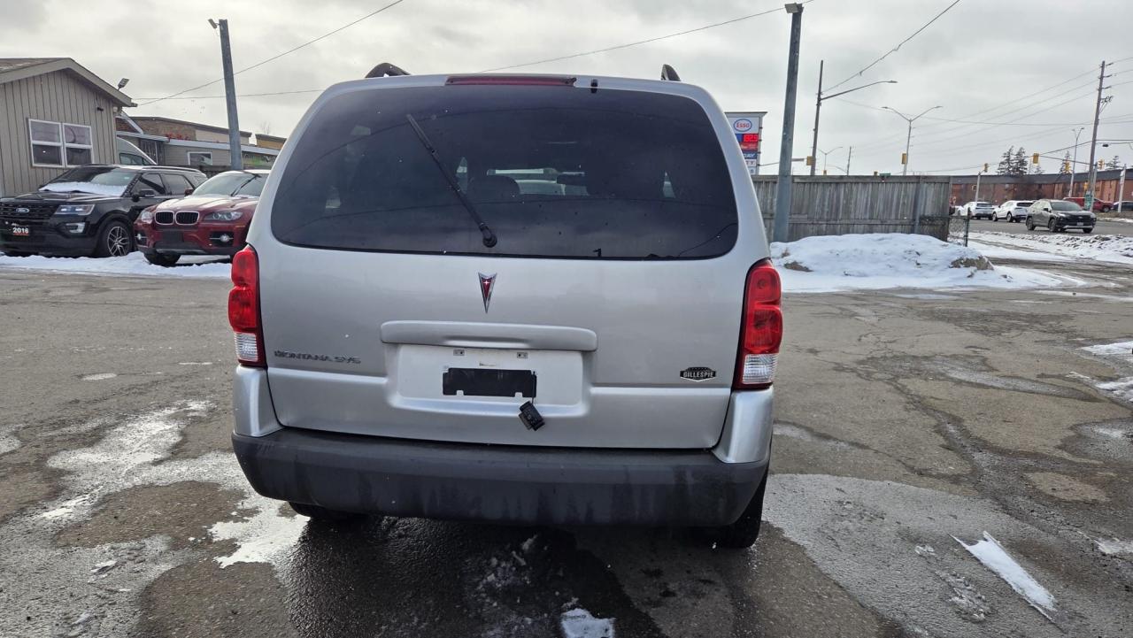 2008 Pontiac Montana w/1SB, DRIVES GREAT, RUSTY UNDERCARRIAGE, AS IS Photo