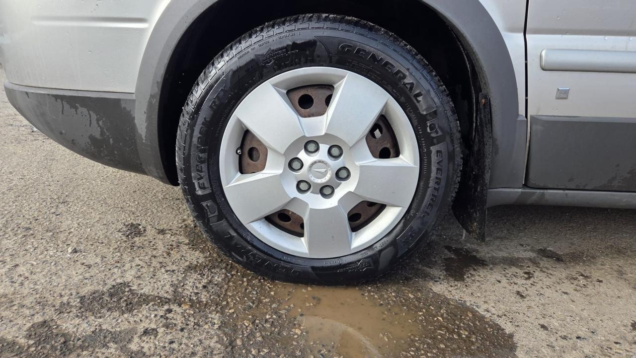 2008 Pontiac Montana w/1SB, DRIVES GREAT, RUSTY UNDERCARRIAGE, AS IS Photo