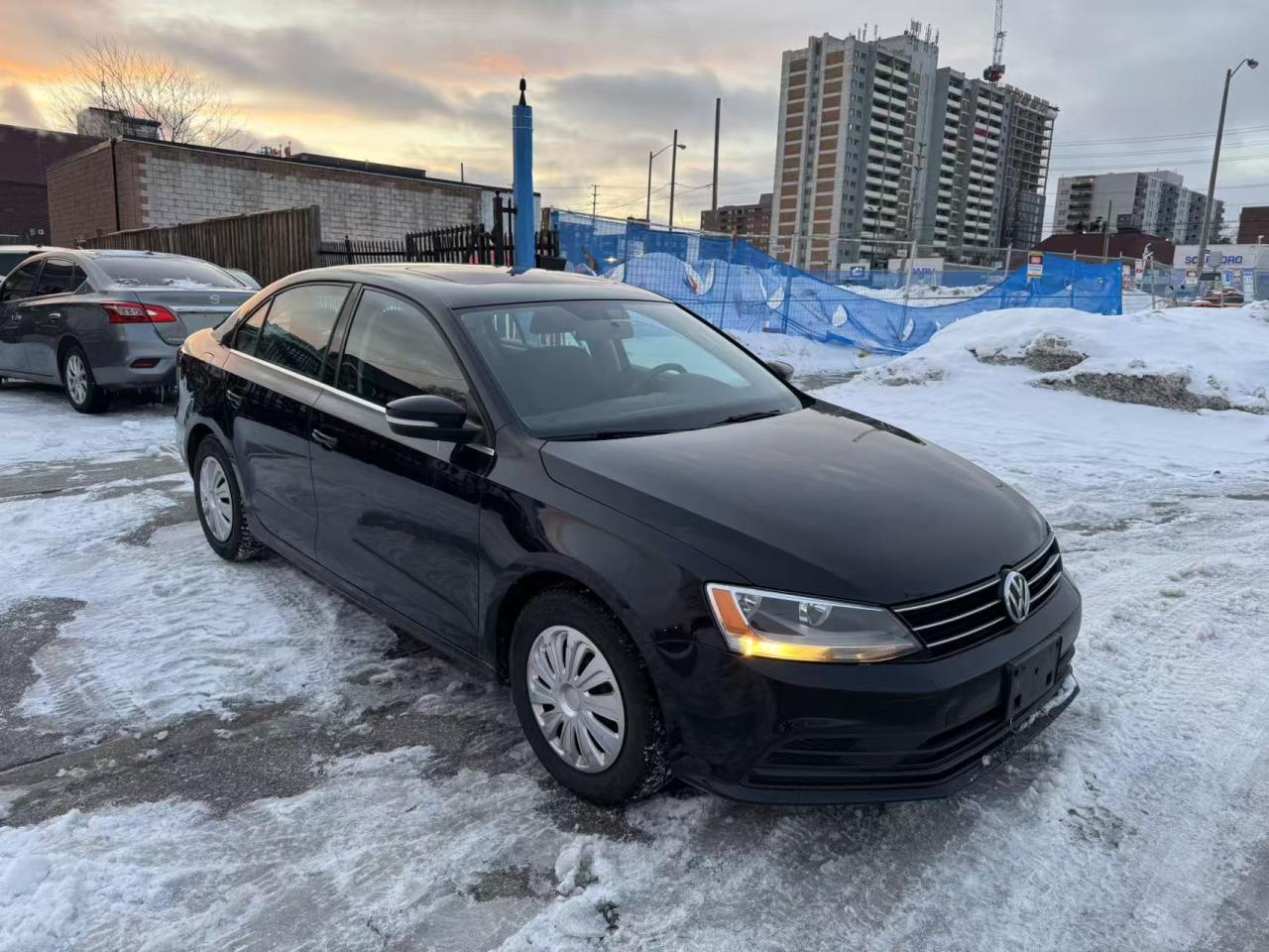 2016 Volkswagen Jetta 4dr 1.4 TSI Auto Trendline+ Photo2