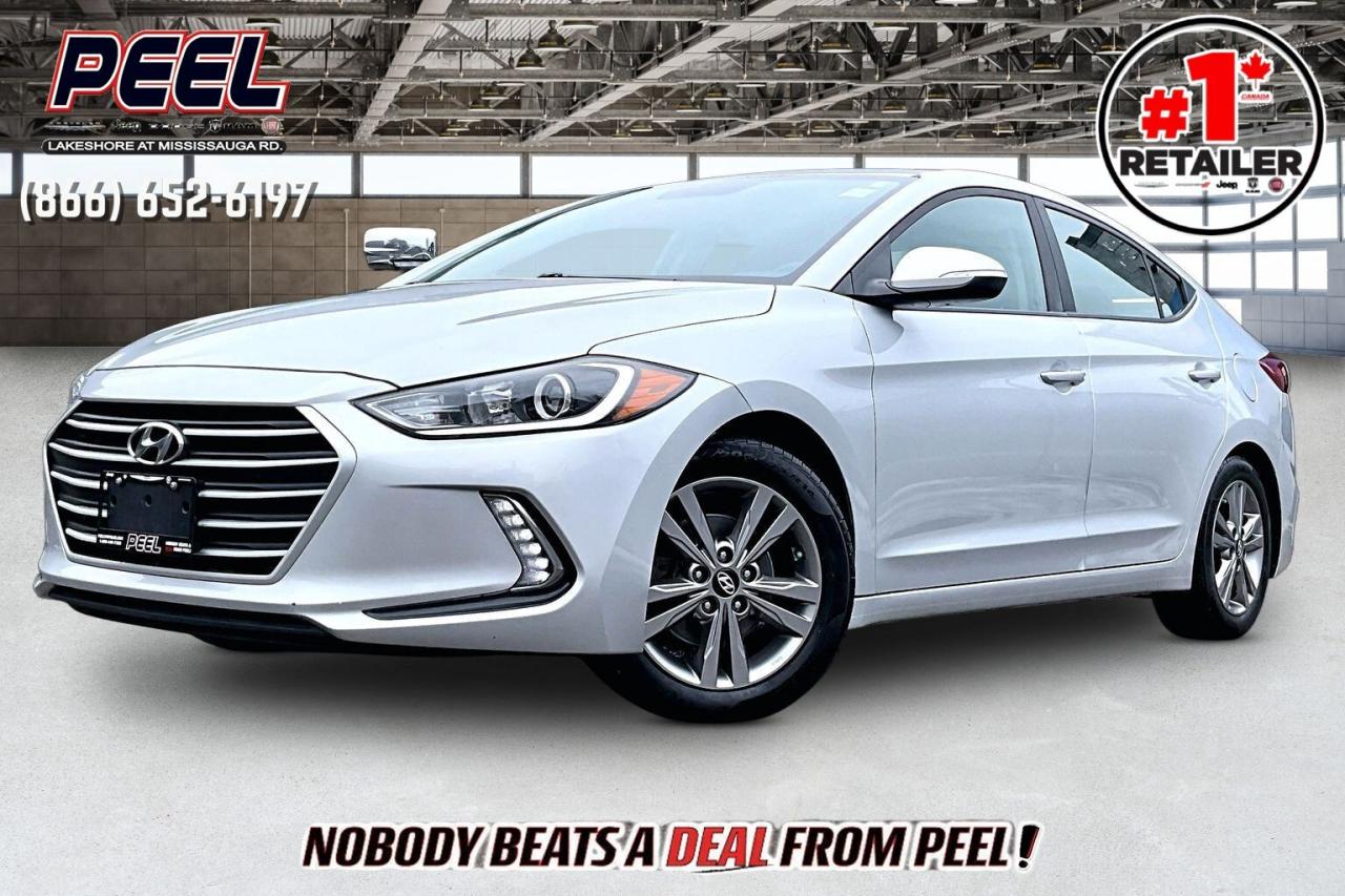 COME SEE WHY NOBODY BEATS A DEAL FROM PEEL! Your Source for ALL make and models used cars and trucks. The True #1 Stellantis Retailer in Ontario for 14 years and running!! (*)

2017 Hyundai Elantra GL FWD | 2.0L I-4 Engine | Platinum Silver Metallic | Heated Cloth Seats | Apple CarPlay & Android Auto | Blind Spot Monitoring | Heated Steering Wheel | Winter Wheels & Tires (As Is)

Smart, efficient, and winter-friendly, this 2017 Hyundai Elantra GL FWD in Platinum Silver Metallic is powered by a 2.0L four-cylinder that makes 147 hp and 132 lb-ft of torque, giving you smooth, confident pull for daily commuting without the fuel bill of something bigger. Slide into heated cloth seats, warm your hands on the heated steering wheel, and enjoy an easy-to-live-with cabin that keeps your drive simple and comfortable, while the touchscreen setup with navigation plus Apple CarPlay and Android Auto helps you stay locked in with maps, calls, and music exactly the way you like it. For peace of mind on busy roads, Blind Spot Monitoring is there to back you up during lane changes. To round it out, the included winter wheels and tires are a huge value add for Canadian seasons, offered as-is, making this Elantra a practical, well-equipped sedan that delivers real comfort and convenience for the money.
______________________________________________________

Engage & Explore with Peel Chrysler: Whether youre inquiring about our latest offers or seeking guidance, 1-866-652-6197 connects you directly. Dive deeper online or connect with our team to navigate your automotive journey seamlessly.

WE TAKE ALL TRADES & CREDIT. WE SHIP ANYWHERE IN CANADA! OUR TEAM IS READY TO SERVE YOU 7 DAYS!
______________________________________________________
Our advertised prices are for consumers (i.e end users) only. 

*FREE CarFax (click the link above to check it out at no cost to you!)*

*FULLY CERTIFIED! (Have you seen some of these other dealers stating in their advertisements that certification is an additional fee? NOT HERE! Our certification is already included in our low sale prices to save you more!)

(*) Based on the Eastern Business Center National Ranking reported sales to actual customers, not including demonstrators.
______________________________________________________

Peel Chrysler  A Trusted Destination: Based in Port Credit, Ontario, we proudly serve customers from all corners of Ontario and Canada including Toronto, Oakville, North York, Richmond Hill, Ajax, Hamilton, Niagara Falls, Brampton, Thornhill, Scarborough, Vaughan, London, Windsor, Cambridge, Kitchener, Waterloo, Brantford, Sarnia, Pickering, Huntsville, Milton, Woodbridge, Maple, Aurora, Newmarket, Orangeville, Georgetown, Stouffville, Markham, North Bay, Sudbury, Barrie, Sault Ste. Marie, Parry Sound, Bracebridge, Gravenhurst, Oshawa, Ajax, Kingston, Innisfil and surrounding areas. On our website www.peelchrysler.com, you will find a vast selection of new vehicles including the new and used Ram 1500, 2500 and 3500. Chrysler Grand Caravan, Chrysler Pacifica, Jeep Cherokee, Wrangler and more. All vehicles are priced to sell. We deliver throughout Canada. website or call us 1-866-652-6197. 

Disclaimer Statement: At Peel Chrysler, your satisfaction is our priority. While many pre-owned vehicles originally come with two keys, variations may occur based on trade-ins, and all Peel Chrysler Pre-Owned Vehicles come standard with one key. Any extras provided by the previous owner will be included with your purchase, and additional keys can be bought at the time of sale. Online prices and payments are for finance purchases. Used vehicles that are being financed are subject to a $499 (^$1500 non-prime) financing fee, while cash purchases (certified cheque, bank draft, or wire transfer) on used vehicles have a $2,000 surcharge ( online price + $2,000). Cash purchases of new vehicles only incur applicable taxes and licensing fees, and those priced above $100,000 (including accessories or add-ons) are subject to a federal luxury tax. Optional finance and lease terms are available, and if trading in a vehicle with an outstanding loan balance requiring Peel Chrysler to facilitate the lien payout, a Lien Payout Fee of $349 applies. Prices, rates, and payments are subject to change without notice. While we strive for accuracy, occasional technical or human errors may occur, so we encourage verifying all vehicle details, including features, options, materials, and specifications, with a Peel Chrysler representative by contacting us or visiting our dealership. Experience seamless convenience with our nationwide delivery options. Visit our website or contact us for more details.