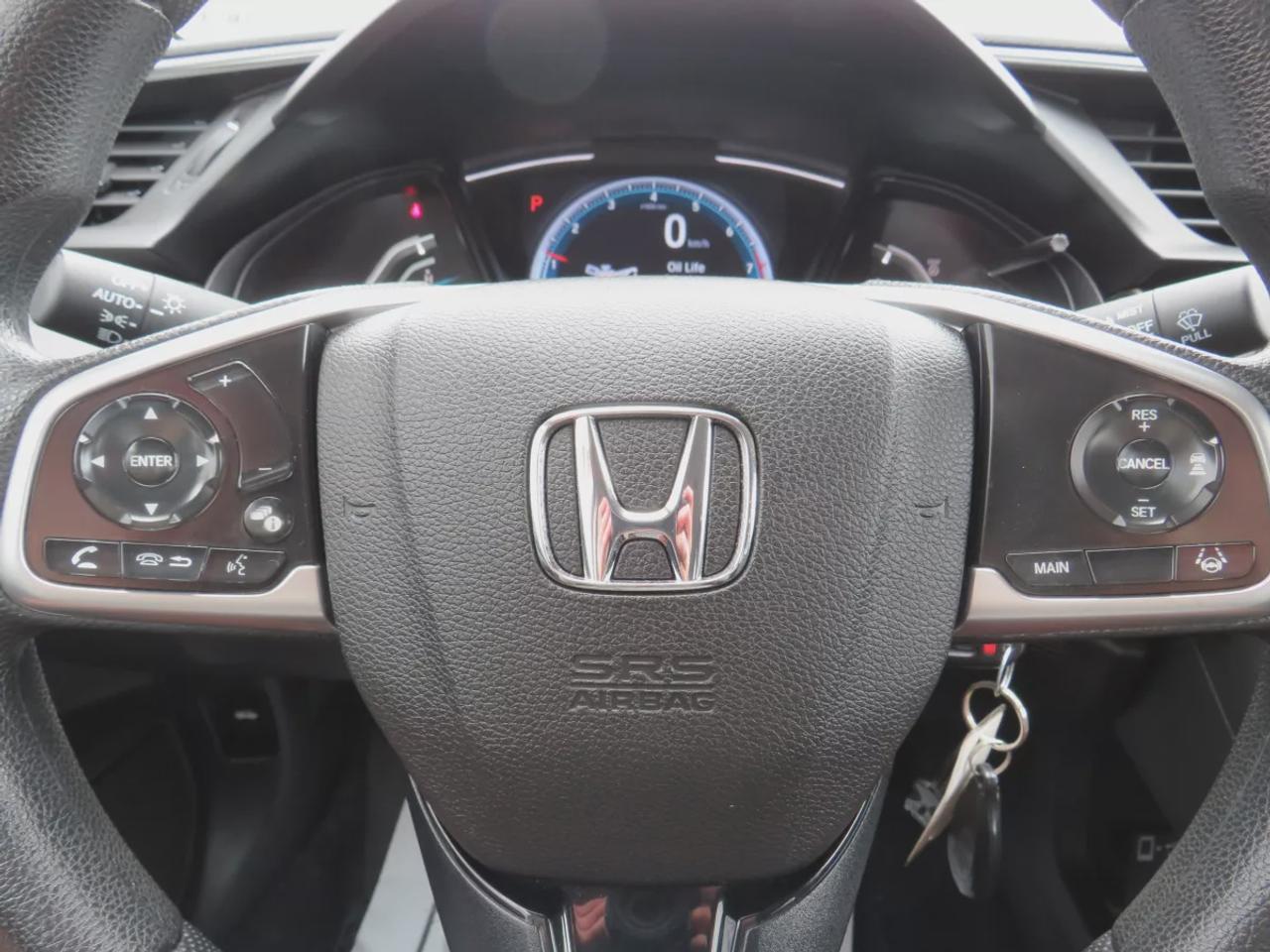 2021 Honda Civic Sedan LX  |  Clean Title | No Accidents  |  Safety Certified  |  Automatic  |  Power Windows  |  Power Locks  |  A/C  |  Digital Touchscreen  |  Lane Assist  |  Collision Warning  |  Reverse Camera  |  Econ Mode  |  Electric Parking Brake  |  Cruise Contr Photo