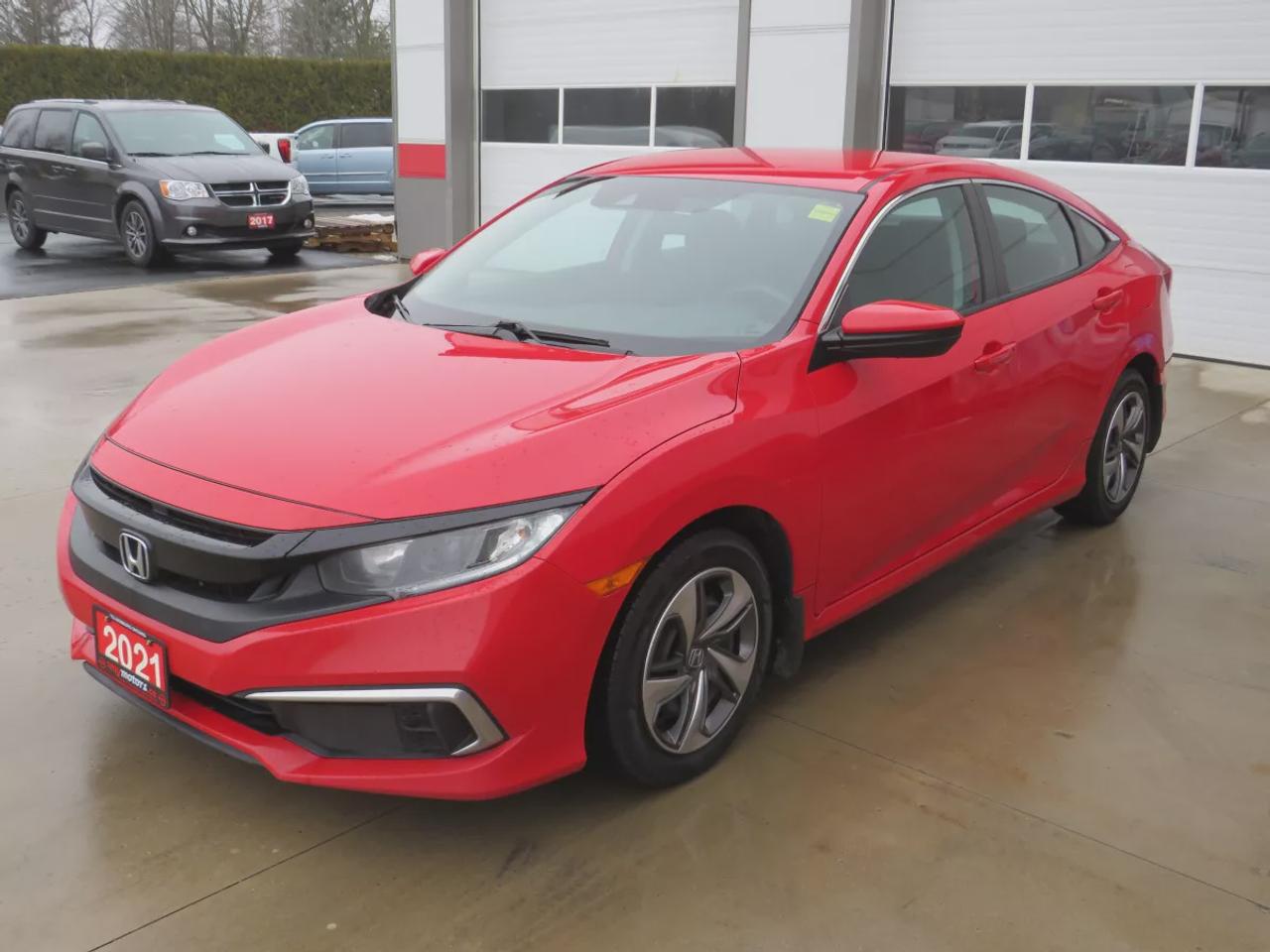 2021 Honda Civic Sedan LX  |  Clean Title | No Accidents  |  Safety Certified  |  Automatic  |  Power Windows  |  Power Locks  |  A/C  |  Digital Touchscreen  |  Lane Assist  |  Collision Warning  |  Reverse Camera  |  Econ Mode  |  Electric Parking Brake  |  Cruise Contr Photo