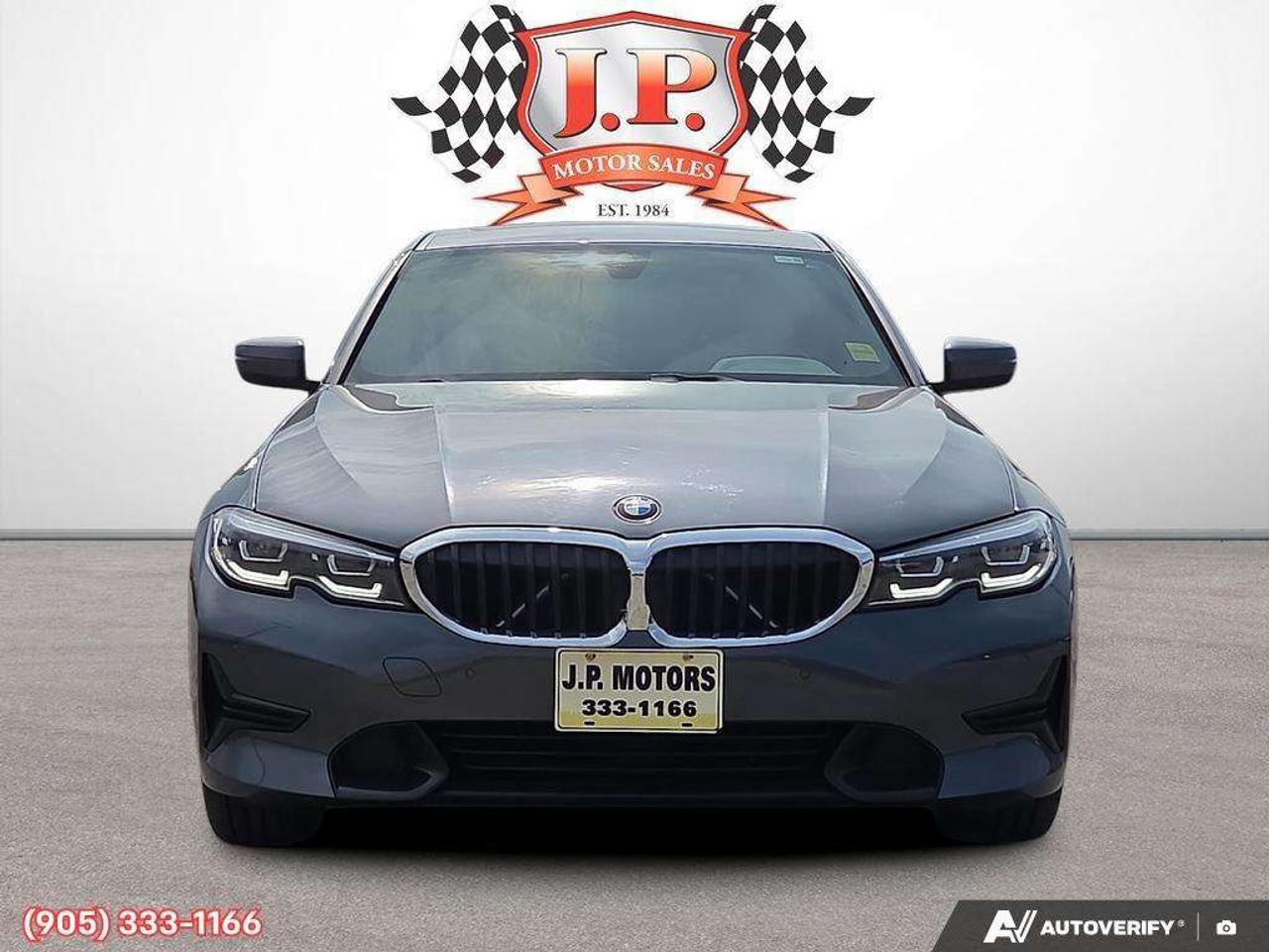 2022 BMW 3 Series i xDrive Apple CarPlay & Android Auto • Power Sunroof • Built-In Navigation System • Remote Start System • Heated Front S Photo1