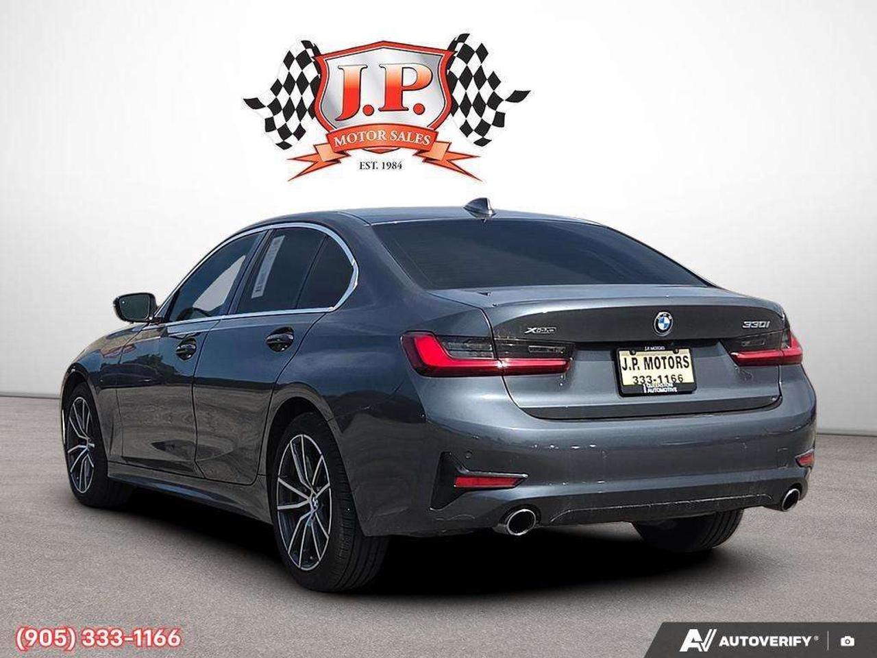 2022 BMW 3 Series i xDrive Apple CarPlay & Android Auto • Power Sunroof • Built-In Navigation System • Remote Start System • Heated Front S Photo