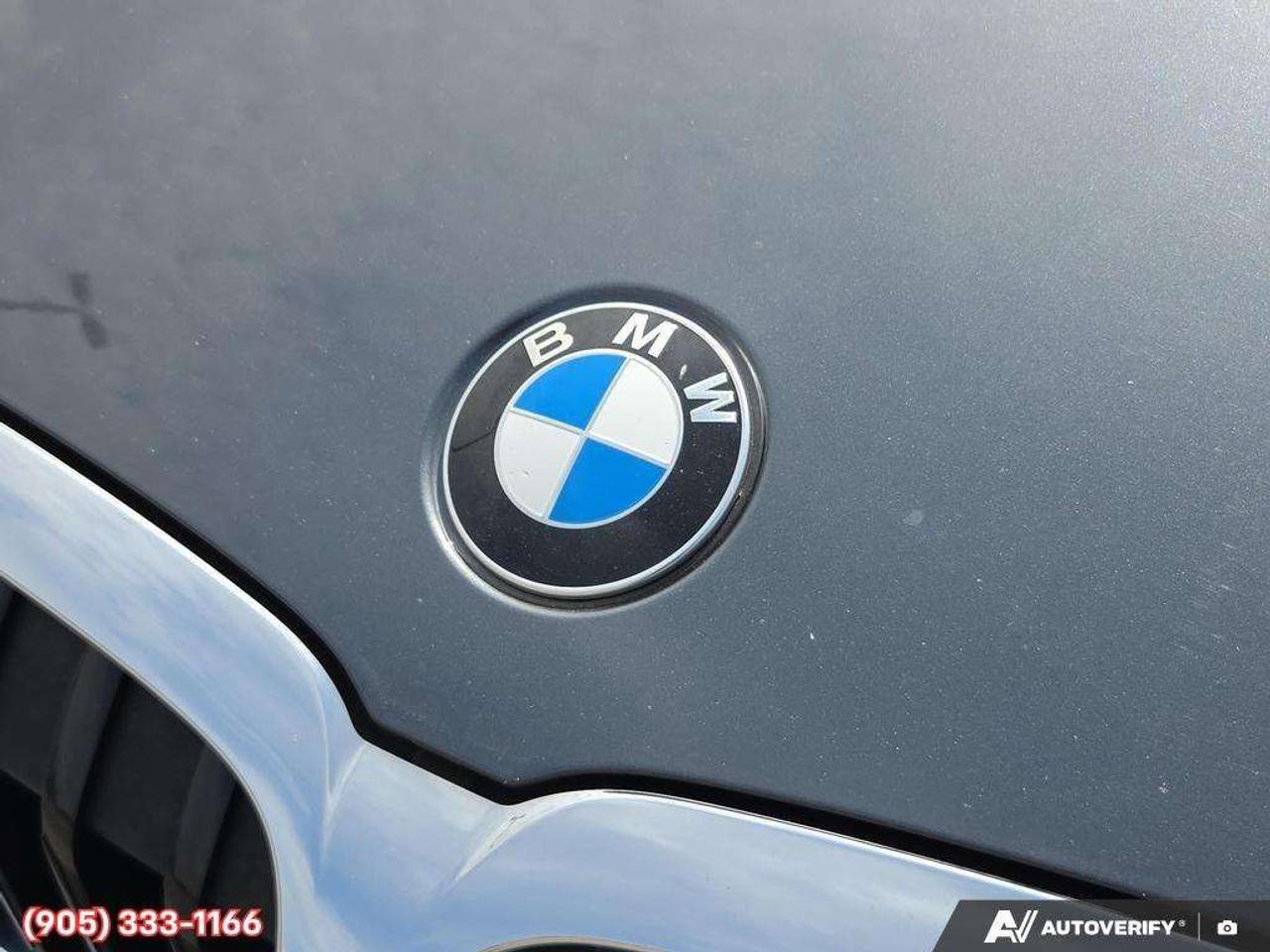2022 BMW 3 Series i xDrive Apple CarPlay & Android Auto • Power Sunroof • Built-In Navigation System • Remote Start System • Heated Front S Photo
