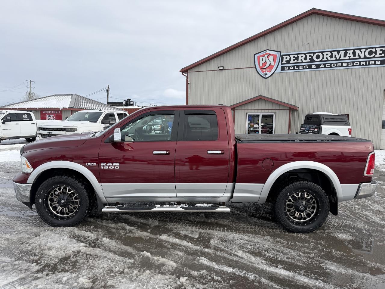 2017 RAM 1500 4WD Quad Cab 140.5  Laramie Photo