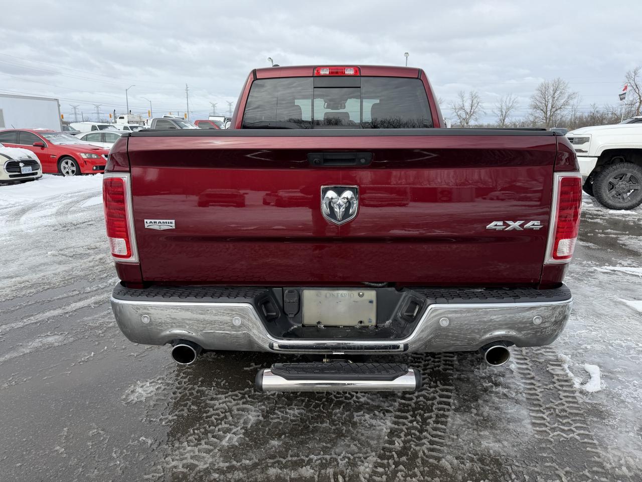 2017 RAM 1500 4WD Quad Cab 140.5  Laramie Photo