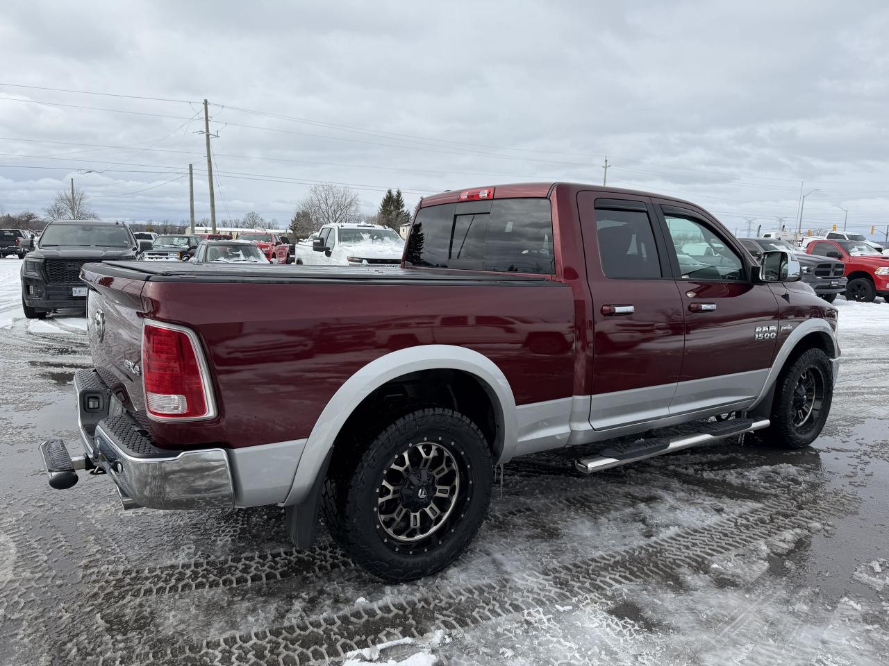 2017 RAM 1500 4WD Quad Cab 140.5  Laramie Photo