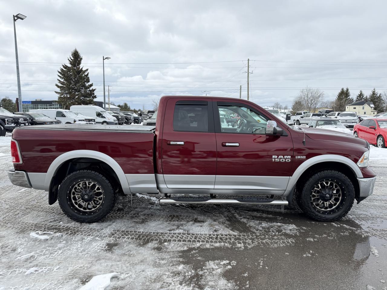 2017 RAM 1500 4WD Quad Cab 140.5  Laramie Photo