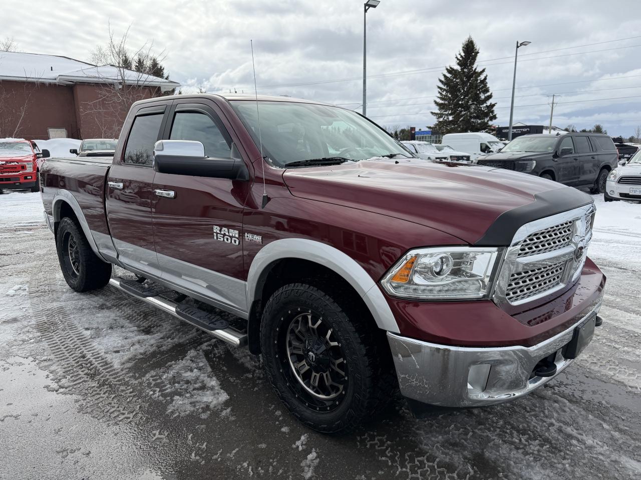 2017 RAM 1500 4WD Quad Cab 140.5  Laramie Photo