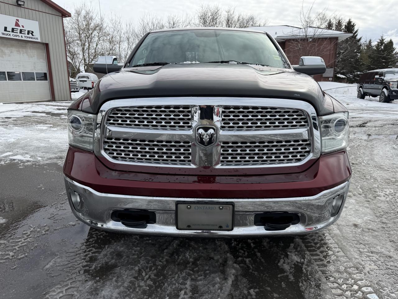 2017 RAM 1500 4WD Quad Cab 140.5  Laramie Photo