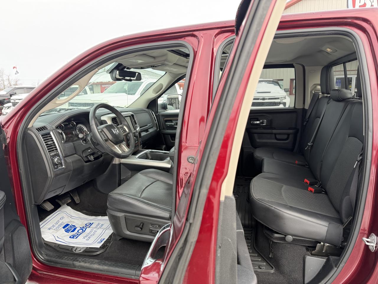2017 RAM 1500 4WD Quad Cab 140.5  Laramie Photo