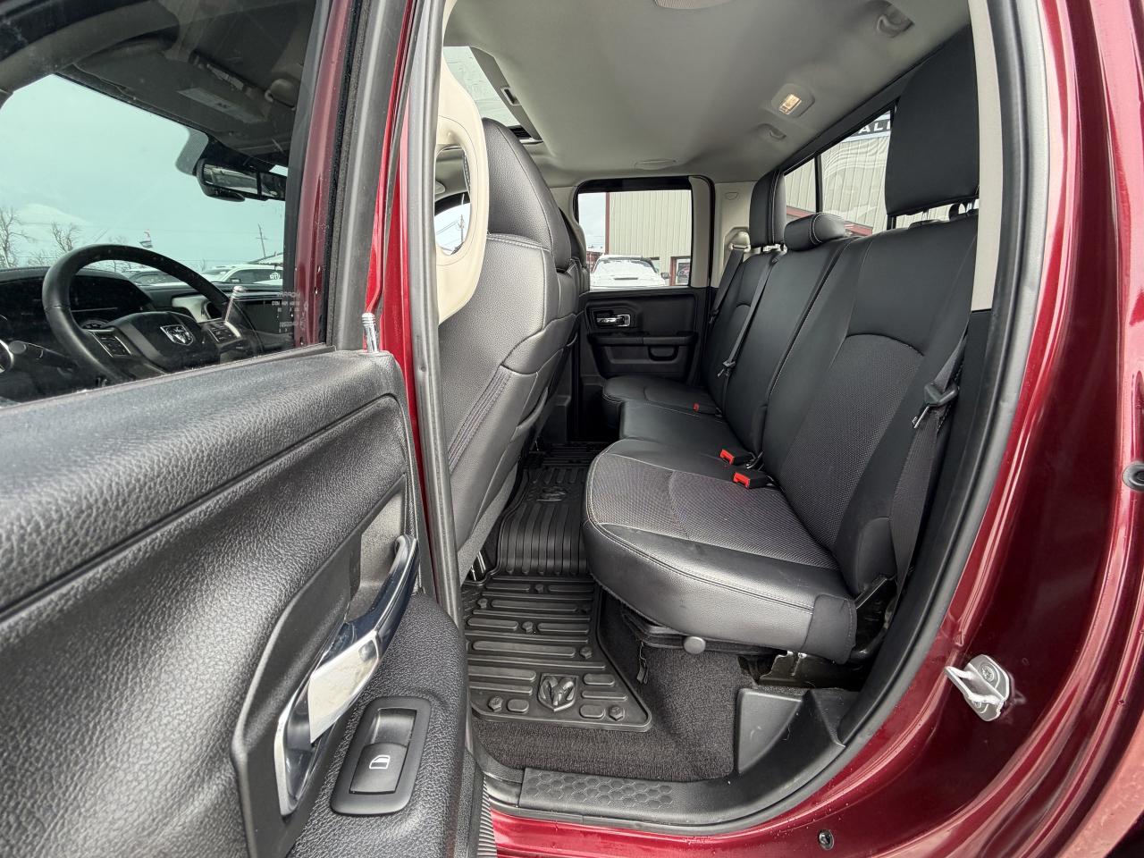 2017 RAM 1500 4WD Quad Cab 140.5  Laramie Photo