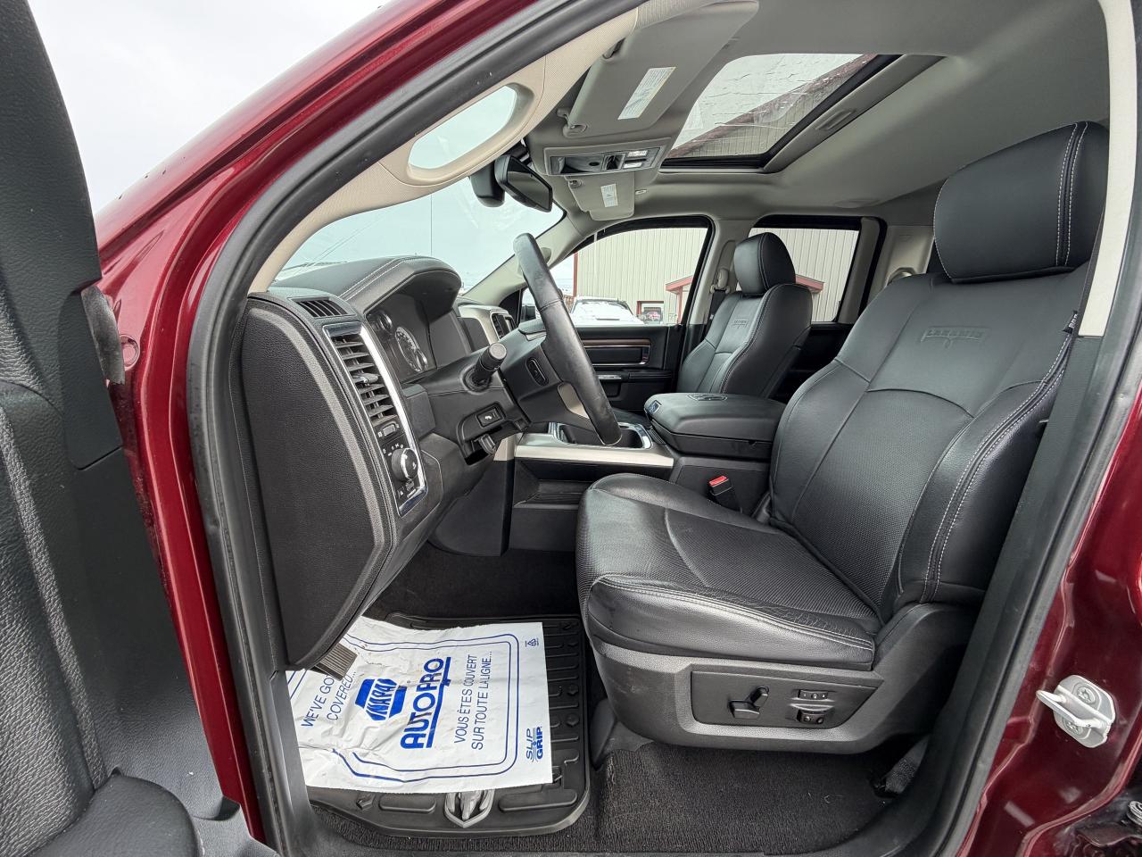 2017 RAM 1500 4WD Quad Cab 140.5  Laramie Photo