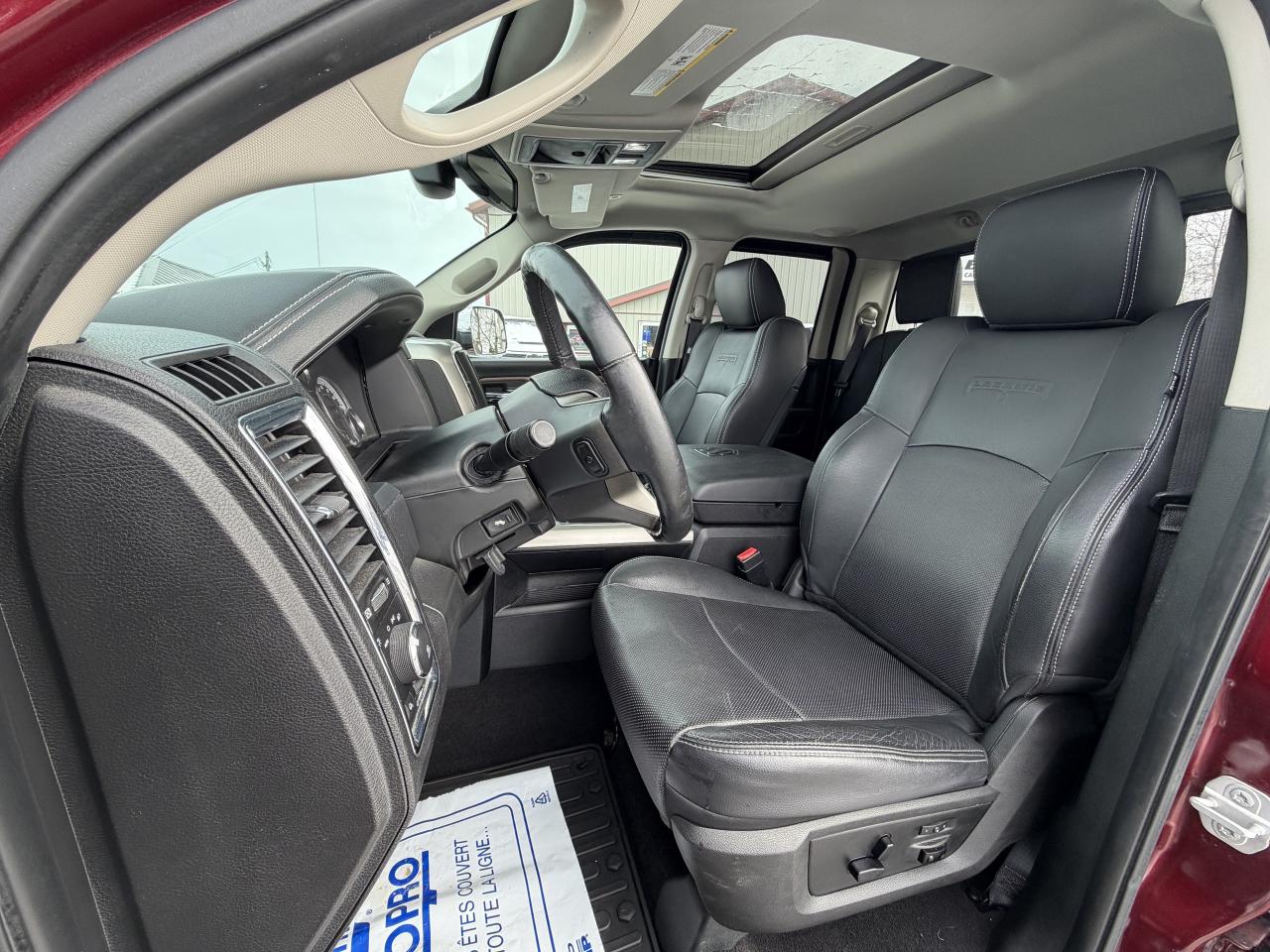 2017 RAM 1500 4WD Quad Cab 140.5  Laramie Photo