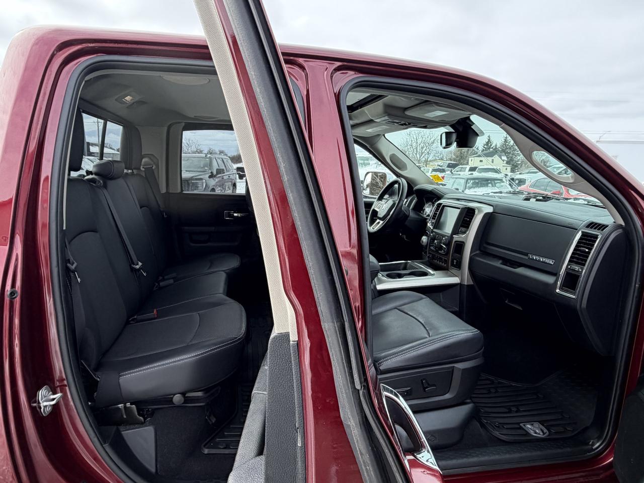 2017 RAM 1500 4WD Quad Cab 140.5  Laramie Photo