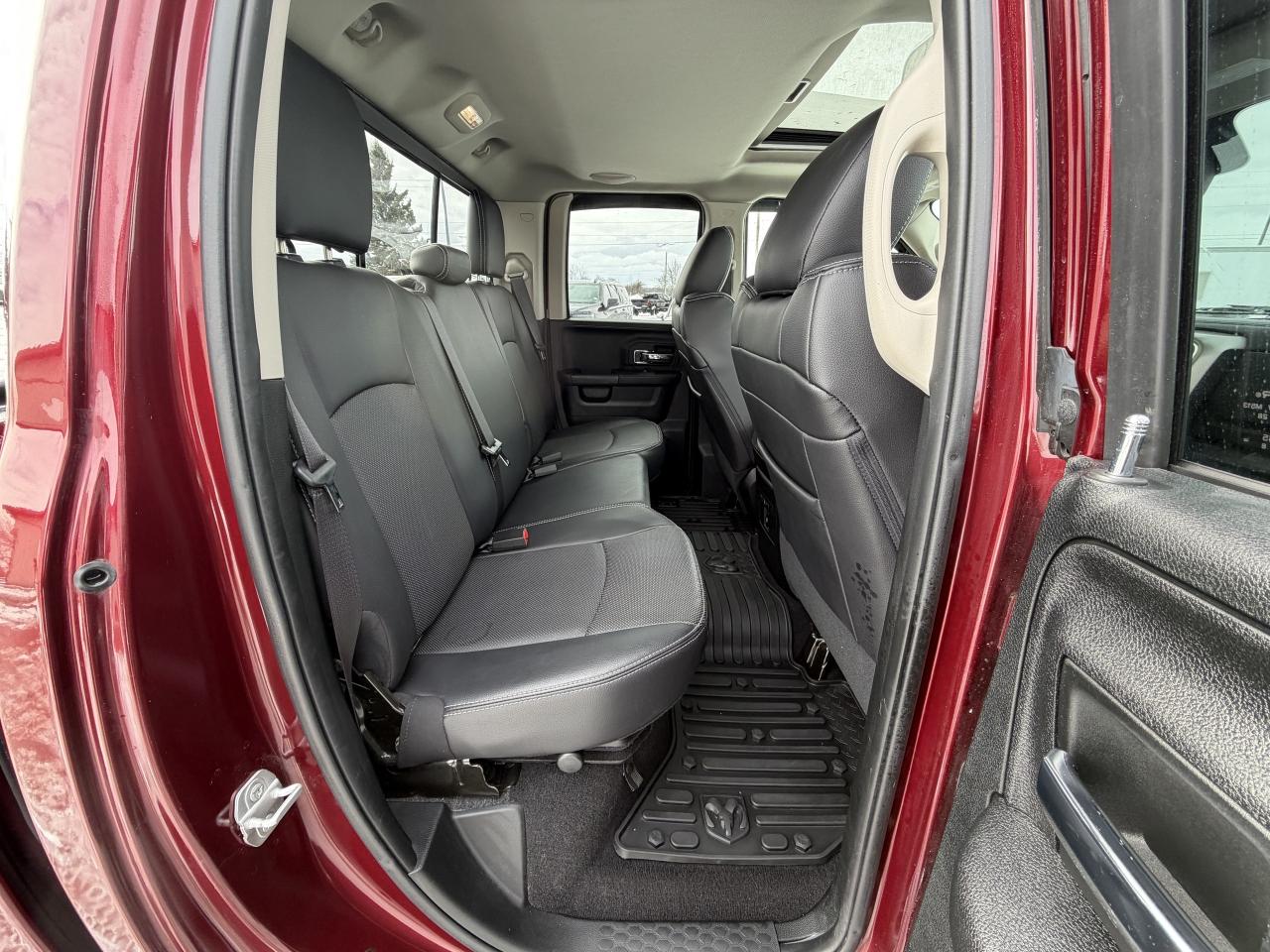 2017 RAM 1500 4WD Quad Cab 140.5  Laramie Photo