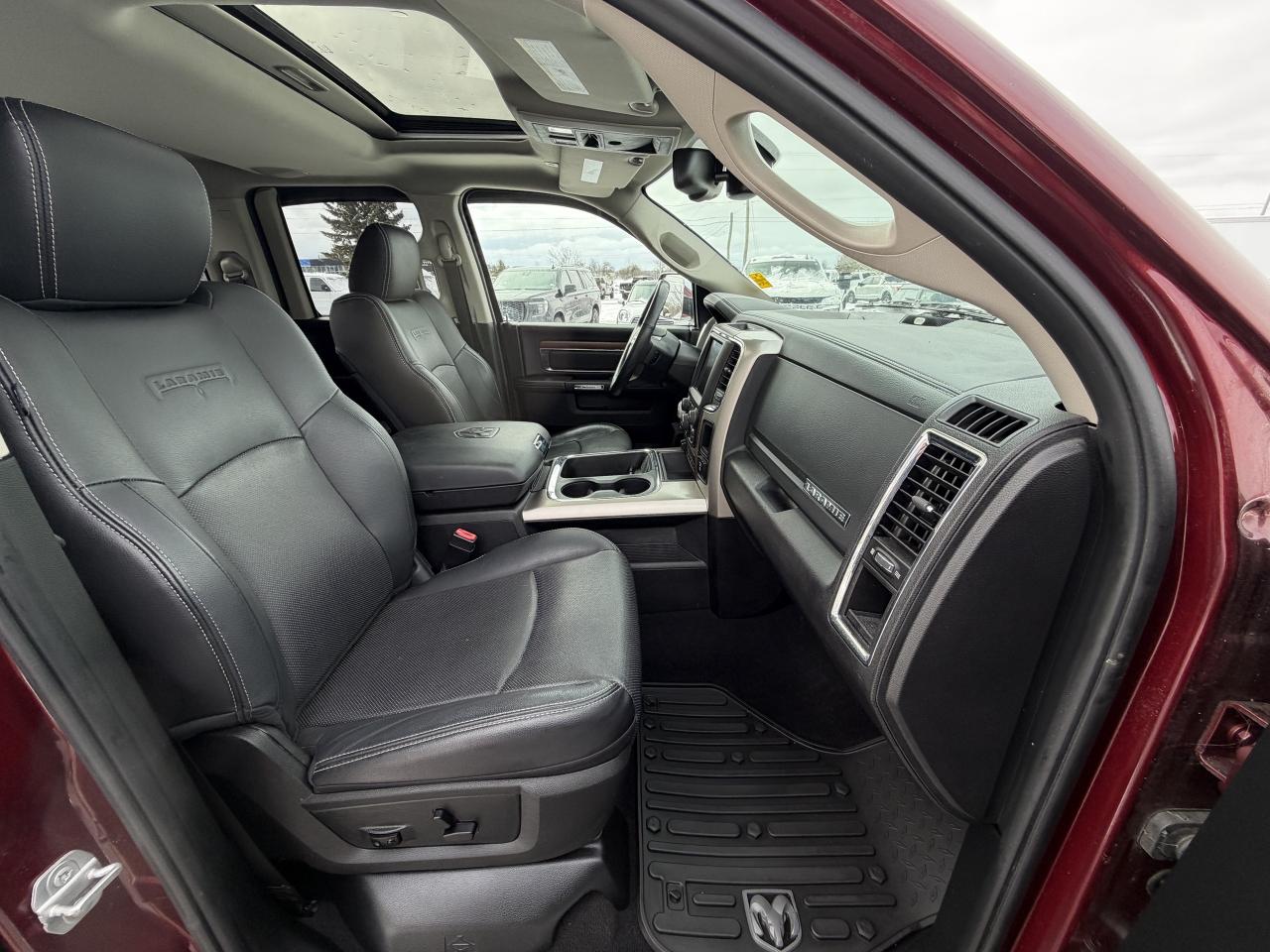 2017 RAM 1500 4WD Quad Cab 140.5  Laramie Photo