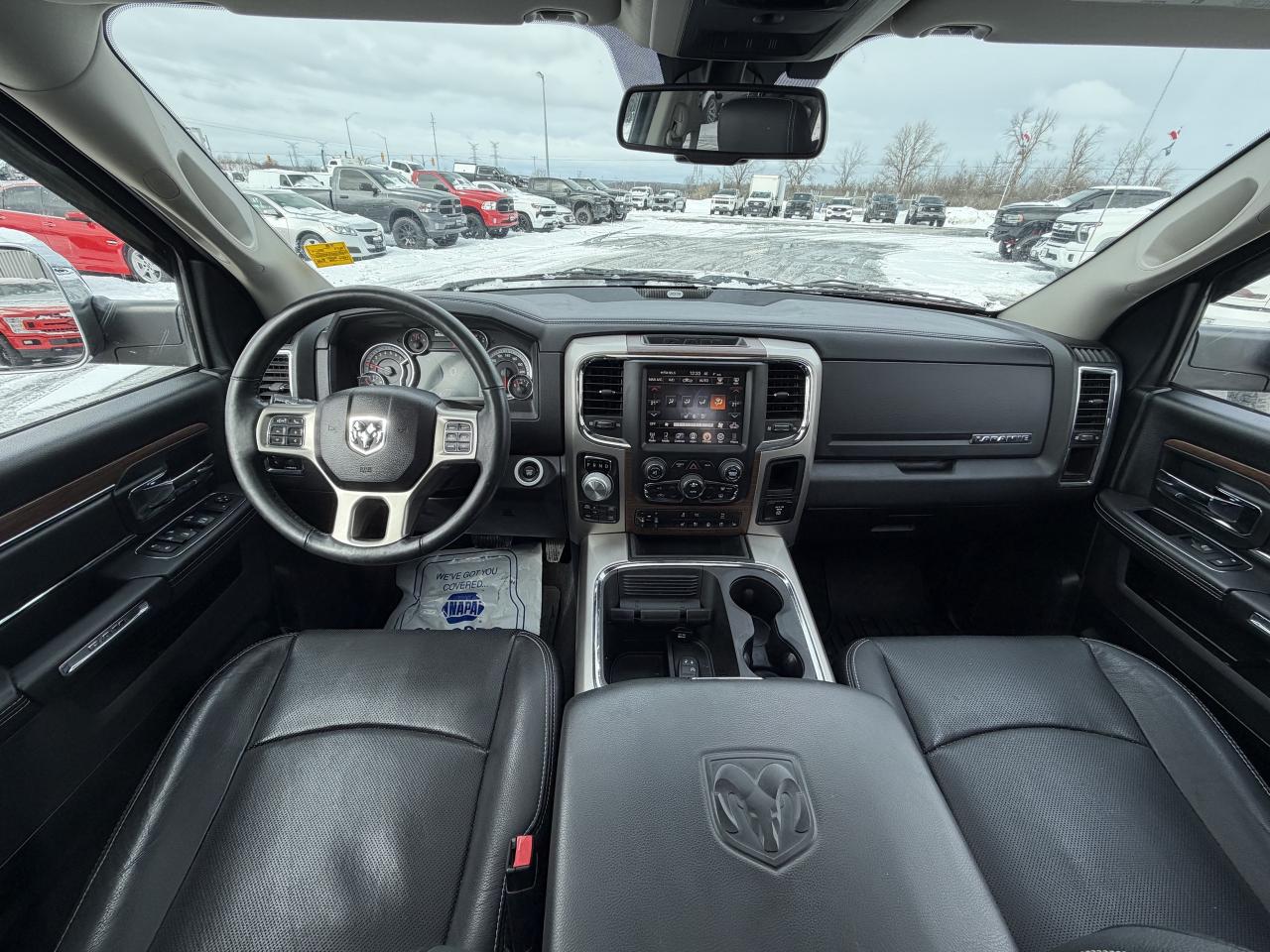 2017 RAM 1500 4WD Quad Cab 140.5  Laramie Photo