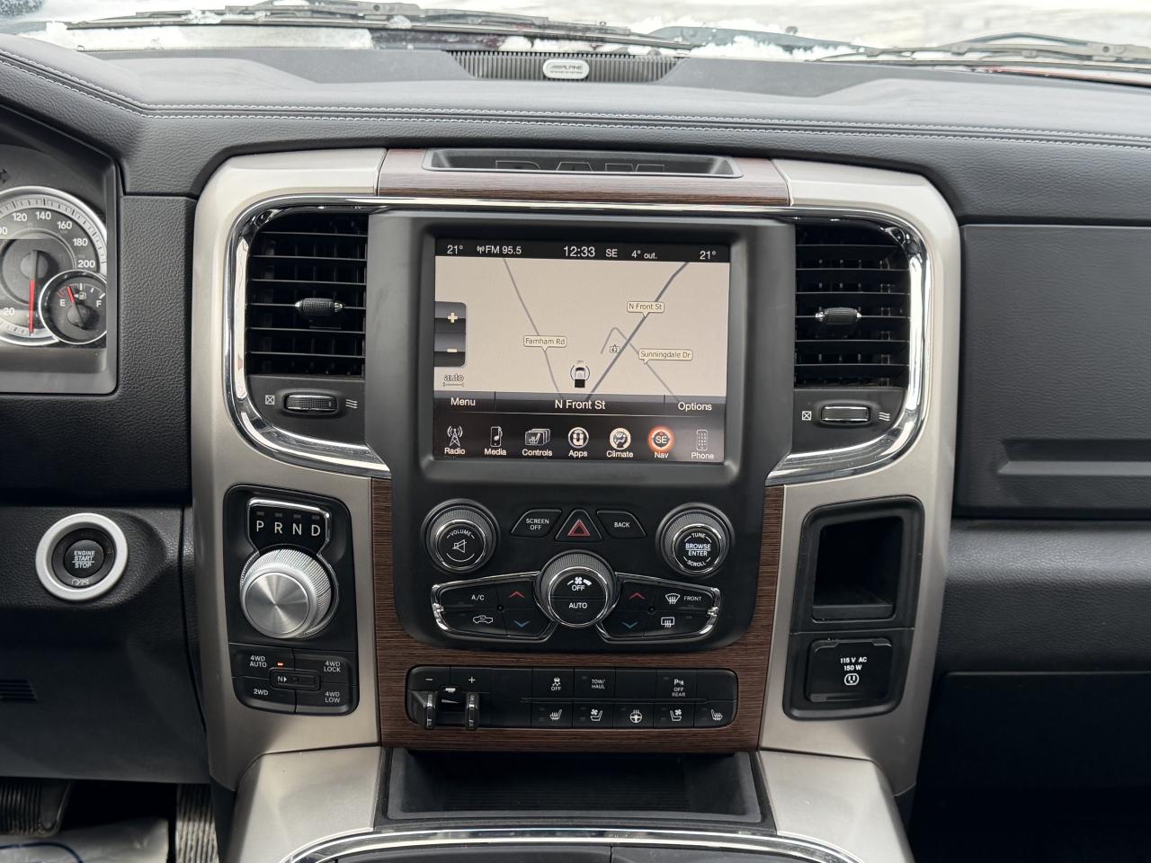 2017 RAM 1500 4WD Quad Cab 140.5  Laramie Photo