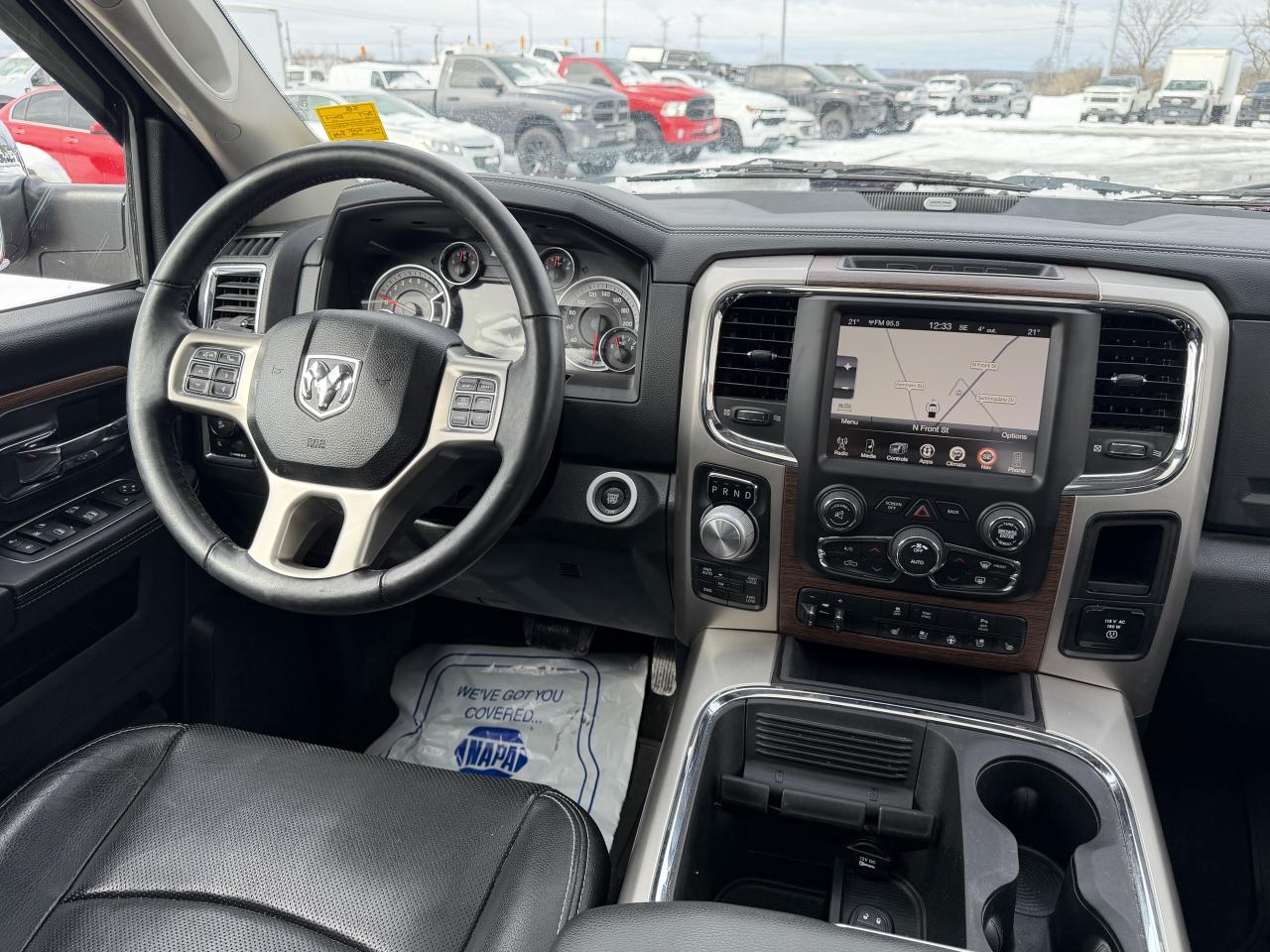 2017 RAM 1500 4WD Quad Cab 140.5  Laramie Photo