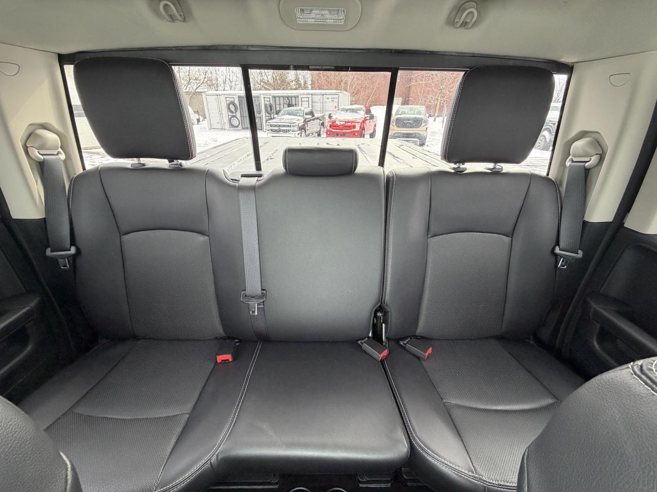 2017 RAM 1500 4WD Quad Cab 140.5  Laramie Photo