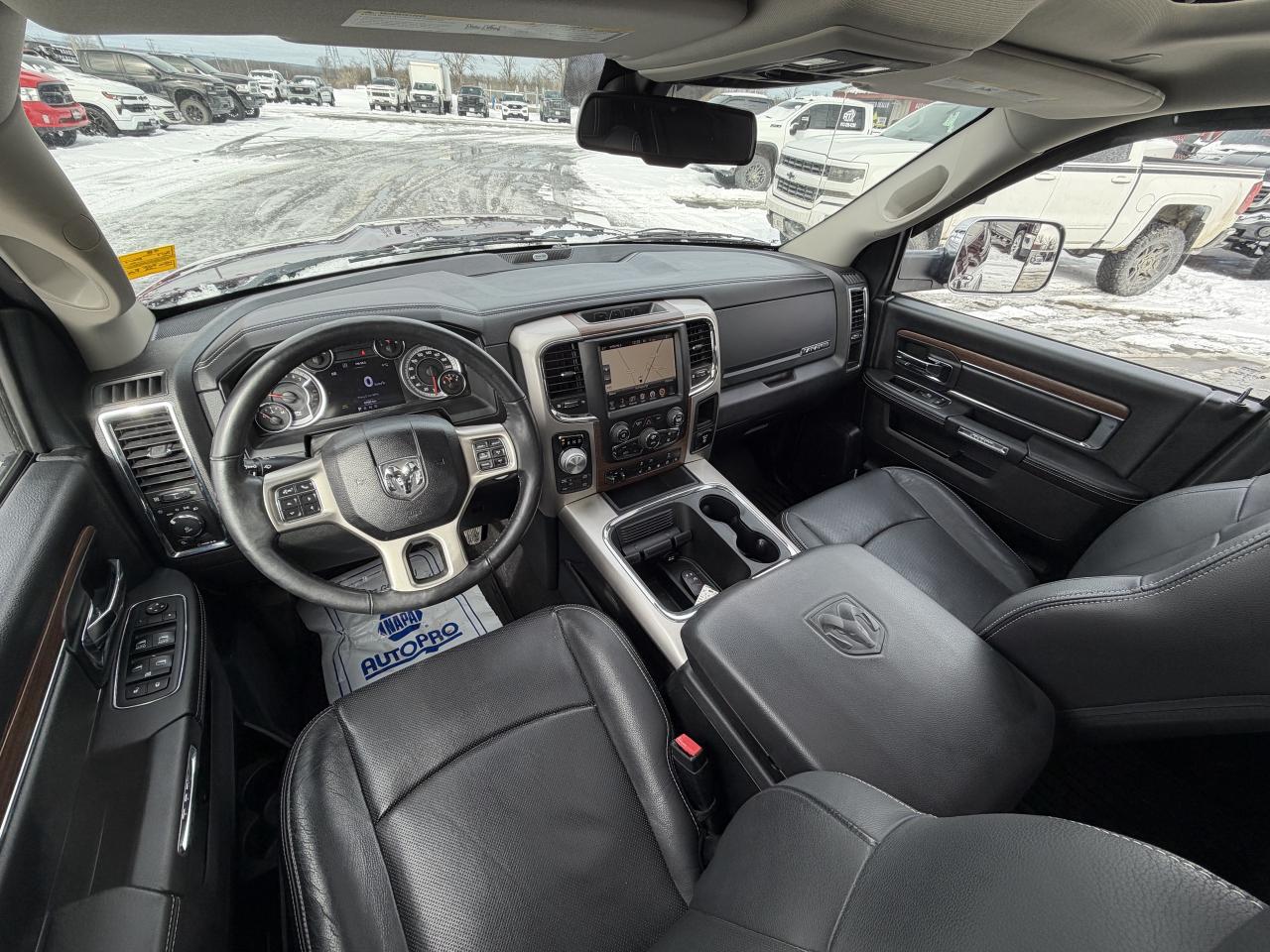 2017 RAM 1500 4WD Quad Cab 140.5  Laramie Photo