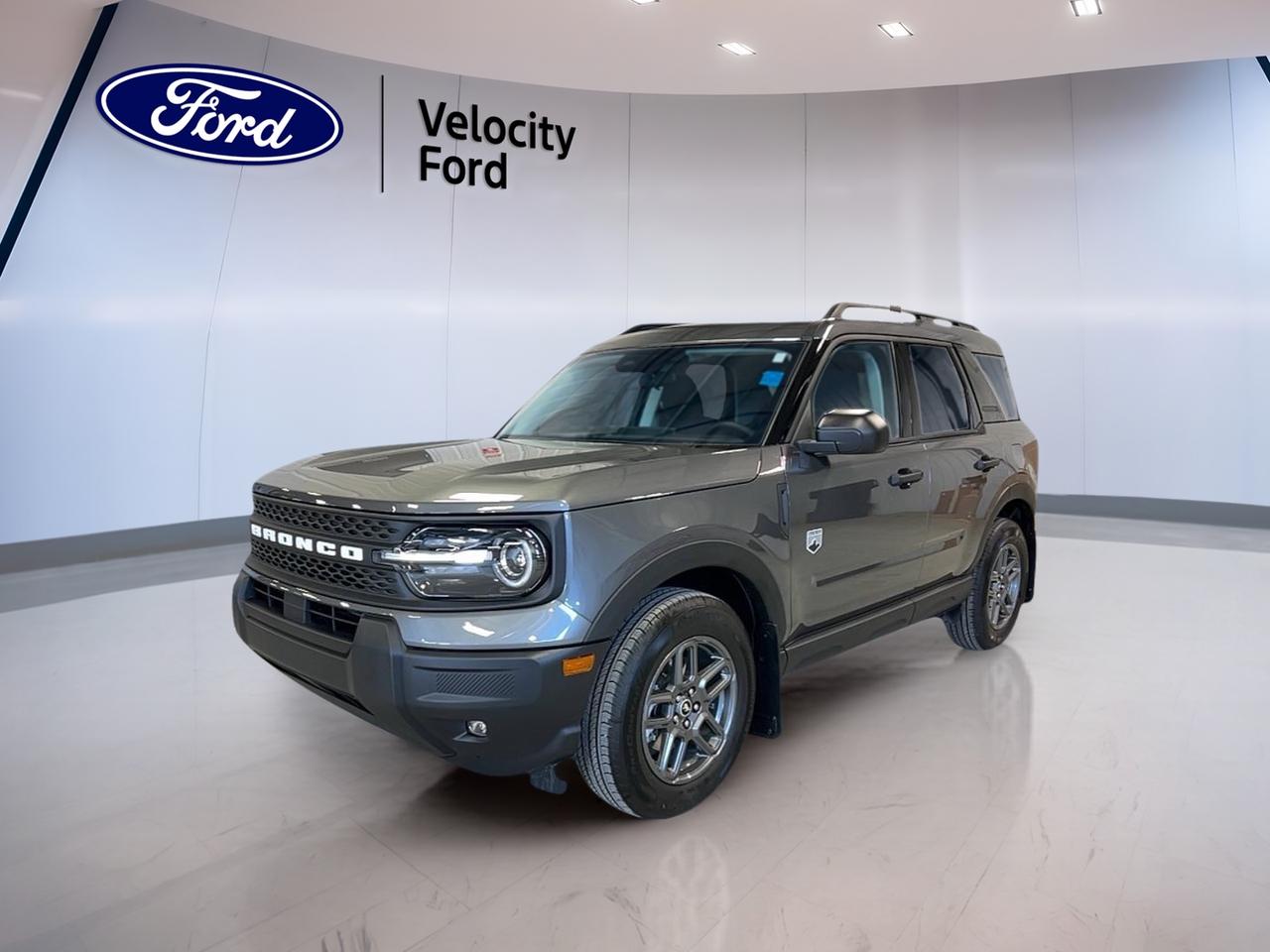 Meet the brand new 2026 Ford Bronco Sport Big Bend, now at Velocity Ford in Moose Jaw. Finished in grey, this 4-door SUV brings the right mix of everyday comfort and true all-weather confidence. With a 1.5-litre gas engine and an 8-speed automatic transmission, its built for smooth commutes, weekend trips, and changing Prairie conditions.

Inside, the cabin is designed to feel welcoming and easy to use, with Medium Light Smoked Truffle cloth heated front bucket seats. The driving position is supportive, and smart touches like push-button start and automatic climate control help make every drive simple. Add in four-wheel drive, and you have an SUV thats ready when the forecast changes fast.

FEATURES OF THE Bronco Sport Big Bend  
»» Four-wheel drive for confident traction  
»» Heated front seats for cold mornings  
»» Push-button start for quick getaways  
»» LED headlamps for clear night visibility  

ADVANCED SAFETY FEATURES  
»» Anti-lock braking system for controlled stops  
»» Stability control helps maintain steady handling  
»» Blind spot monitor for safer lane changes  
»» Lane departure warning adds extra awareness  

PERFORMANCE AND EFFICIENCY  
»» 1.5-litre gas engine for daily versatility  
»» 8-speed automatic transmission shifts smoothly  
»» Power steering for easy low-speed control  
»» Four-wheel drive supports changing road conditions  

COMFORT AND CONVENIENCE  
»» Automatic climate control keeps cabin comfortable  
»» Front air conditioning for quick cool downs  
»» Driver lumbar support for longer drives  
»» Power windows for easy one-touch use  

TECHNONOLGY AND CONNECTIVITY  
»» Bluetooth integration for hands-free calling  
»» Steering wheel audio controls within easy reach  
»» Satellite radio for more listening choices  
»» WiFi hotspot helps keep devices connected  

CARGO SPACE  
»» Rear trunk access makes loading simple  
»» Four-door layout improves everyday usability  
»» Tinted windows help reduce cabin glare  
»» Rear window defroster aids winter visibility  

WHAT OTHER OWNERS LIKE  
»» Confident feel from four-wheel drive  
»» Helpful blind spot monitoring in traffic  
»» Heated seats for winter commuting comfort  
»» Easy connectivity through Bluetooth and WiFi  

This brand new 2026 Ford Bronco Sport Big Bend is ready to deliver the practical features Moose Jaw drivers want, with the safety tech and comfort upgrades that make daily driving feel easier. Visit Velocity Ford to see the grey finish in person and take it for a drive.

This 2026 Ford Bronco Sport Big Bends VIN is: 3FMCR9BN8TRE03711.