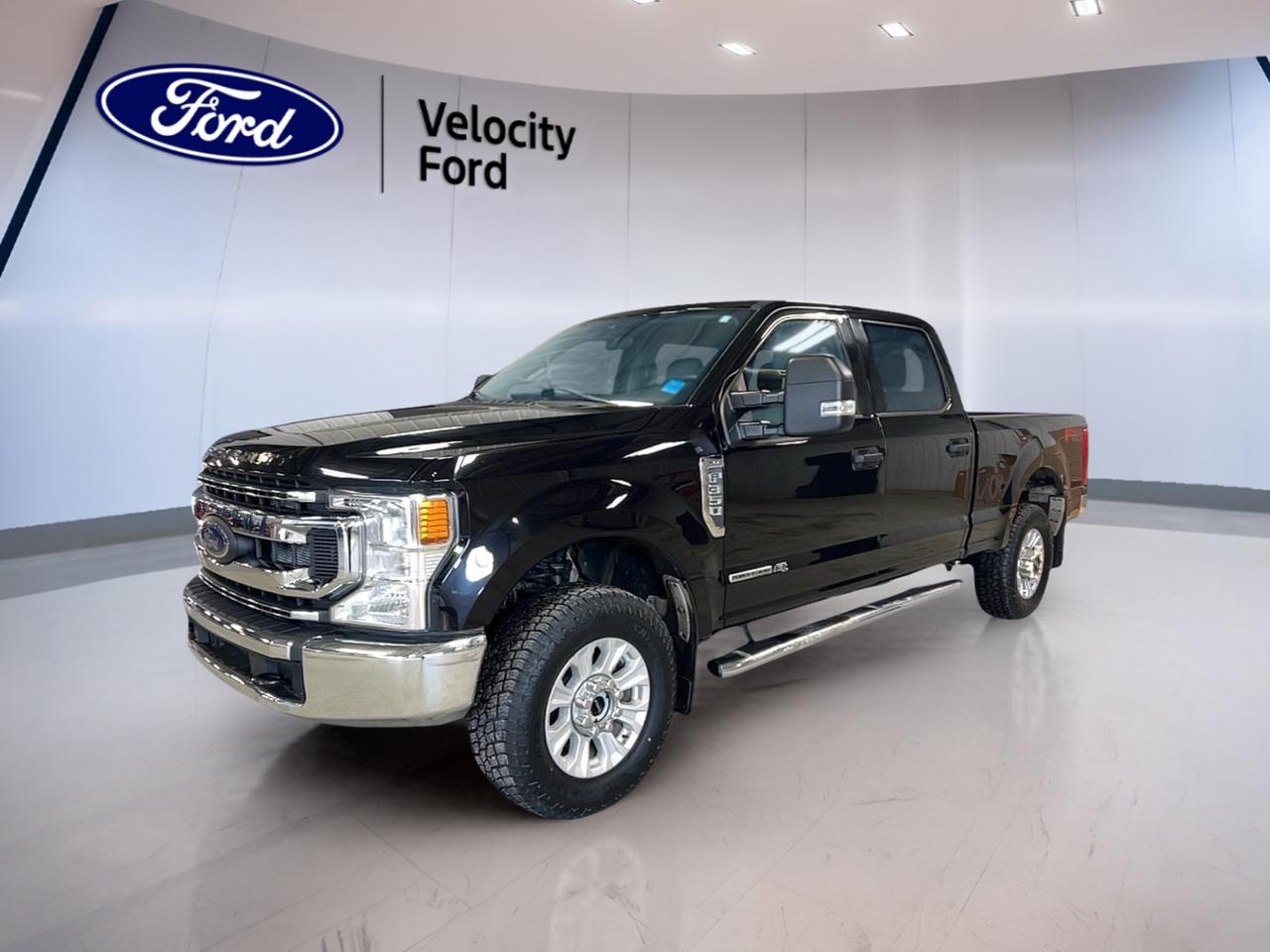 Built for serious work and confident everyday driving, this used 2020 Ford Super Duty F-350 SRW XLT Crew Cab is ready for Moose Jaw roads and Saskatchewan job sites. With a Black exterior, Grey interior, 4 full doors, and an automatic transmission paired to a 6.7-litre diesel engine, it delivers the kind of strength truck owners count on. With 125,870 km, its a proven heavy-duty pickup that still has plenty to give, and its offered here at Velocity Ford.

This 2020 Ford Super Duty F-350 SRW XLT Crew Cab is also equipped with smart, practical features that make long days easier. You get a backup camera for tight spots, a blind spot monitor for added awareness, and stability control with Anti-Lock Braking System (ABS) to help keep you composed in changing conditions. Add in 4-wheel drive (4WD) and a limited slip differential, and you have a truck thats prepared for winter traction and rougher surfaces.

TRUCK FEATURES  
»» Towing capacity rated at 5,442 kg  
»» Four-wheel drive for tough conditions  
»» Limited slip differential for improved traction  
»» Rear tow hook for recovery needs  

ADVANCED SAFETY FEATURES  
»» Anti-Lock Braking System for controlled stops  
»» Stability Control helps maintain steady handling  
»» Blind Spot Monitor for safer lane changes  
»» Driver and passenger airbags for protection  

PERFORMANCE AND EFFICIENCY  
»» 6.7-litre diesel engine for heavy work  
»» Automatic transmission for smooth power delivery  
»» Dual shift mode for manual control  
»» Power steering for easier low-speed turns  

COMFORT AND CONVENIENCE  
»» Front air conditioning for cabin comfort  
»» Power windows for quick, easy control  
»» Cruise Control for relaxed highway driving  
»» Driver lumbar support for longer trips  

TECHNONOLGY AND CONNECTIVITY  
»» Bluetooth Integration for hands-free calling  
»» Steering wheel audio controls within reach  
»» Satellite radio for more listening choice  
»» WiFi hotspot support for connected travel  

CARGO SPACE  
»» Rear trunk access for in-cab storage  
»» Crew Cab space for gear behind seats  
»» Spare tire onboard for roadside readiness  
»» Tinted windows help protect interior items  

WHAT OTHER OWNERS LIKE  
»» Strong diesel pulling power under load  
»» Confident towing and highway stability  
»» Useful driver-assist features like blind spot  
»» Cabin space from the Crew Cab  

This 2020 Ford Super Duty F-350 SRW XLT Crew Cabs VIN is: 1FT8W3BT7LEE29637.