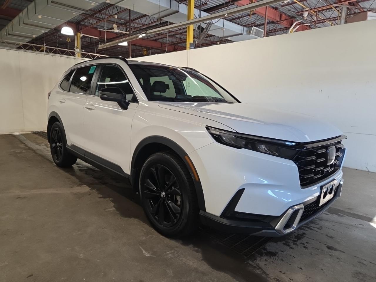 2023 Honda CR-V Hybrid TOURING AWD | NO ACCIDENTS | NAV | LTHR | ROOF Photo