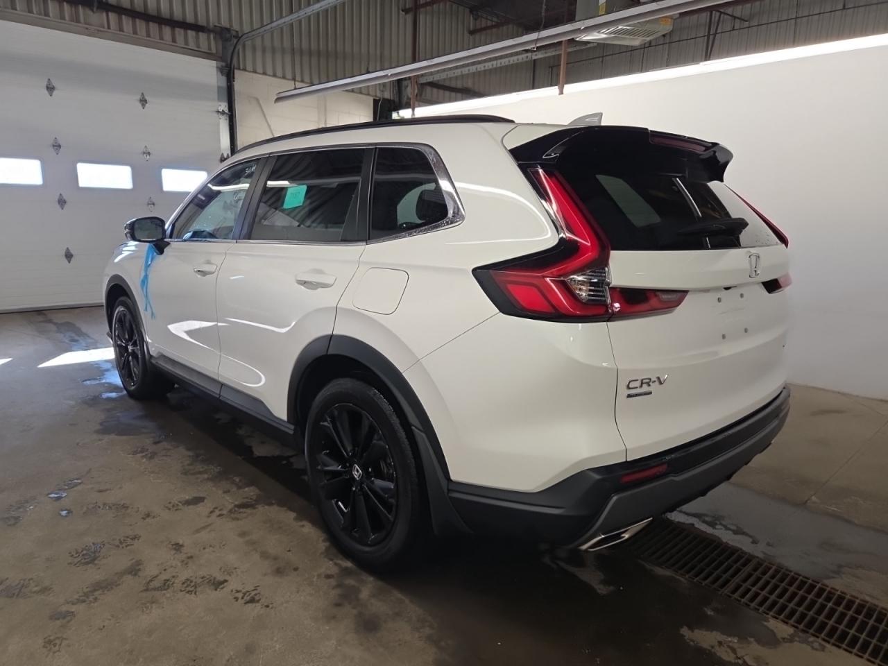 2023 Honda CR-V Hybrid TOURING AWD | NO ACCIDENTS | NAV | LTHR | ROOF Photo