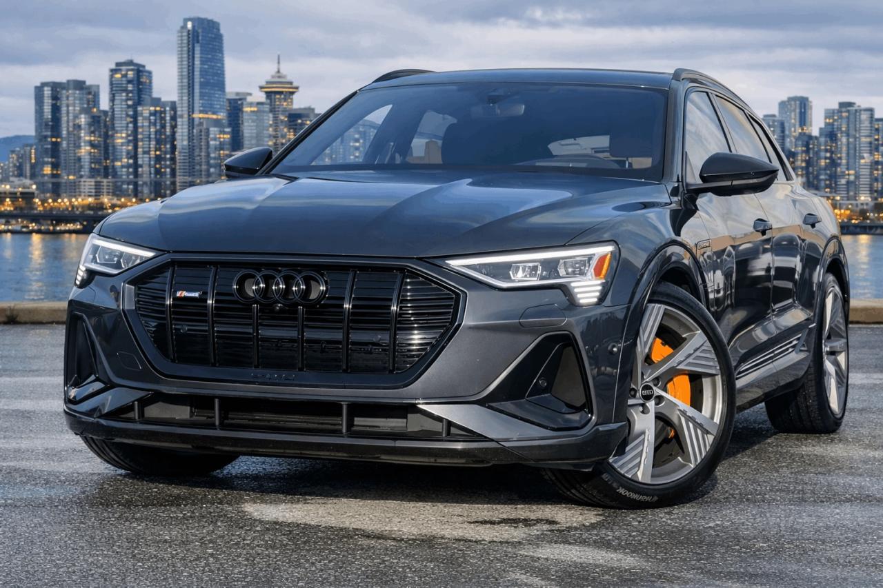 <p>2022 AUDI ETRON TECHNIK S-LINE</p><p>TRUE PRICE, NO HIDDEN FEE, FREE CARFAX, FULL INSPECTION REPORT</p><p>NO ACCIDENT, LOW KM</p><p>Highlight Features</p><p>- 360 Degree Backup Camera& Parking Sensor</p><p>- Navigation System</p><p>- Soft Close Door</p><p>- Heads-Up Display</p><p>- Air Suspension</p><p>- Blind Spot Monitor</p><p>- Lane Keeping Assist</p><p>- Pre-Collision System</p><p>- Rear Cross Traffic Alert</p><p>- Heated& Ventilated Seats</p><p>- Rear Heated Seats</p><p>- Quad Zone Climate Control</p><p>- B&O Sound System</p><p>- Apple Carplay</p><p>- Wireless Charging&nbsp;</p><p>- Bluetooth Technology</p><p>- FM/AM Radio</p><p>- Adaptive Cruise Control</p><p>- Variable Driving Mode</p><p>- AND MUCH MORE</p><p><br></p><p><p>Although every attempt is made to ensure the accuracy of the data above, due to the possibility of human error, we cannot guarantee the accuracy of the displayed information, the availability of this vehicle, or the accuracy of its photo or stock photo. Such information may not reflect exact vehicle color, trim, options, price or other specifications.<br></p><p><br></p><br><p><br></p><p><strong><strong><strong><strong><strong><strong><span>*** FULL CARFAX REPORT AND INSPECTION PAPER AVAILABLE!!***</span></strong></strong></strong></strong></strong></strong></p><p><strong><strong><strong><span>*** BEST VALUE FOR YOUR TRADE-IN OR SELL US YOUR CARS!!***</span></strong></strong></strong></p><p><strong><strong><strong><span>*** COMPETITIVE RATE FOR FINANCING!!***</span></strong></strong></strong></p><p><strong><strong><strong><span><br></span></strong></strong></strong></p><p><strong><strong><strong><strong>DL#40299 UC Auto</strong></strong></strong></strong><br></p><p><strong><strong><strong><span>3891 No 3 Rd, Richmond, BC V6X 2B8</span></strong></strong></strong></p><p><span>*All price excludes $995 Doc Fee& $995Vehicle Preparation Fee,<span>&nbsp;</span>applicable taxes.*</span></p><p><br></p><p><strong><span>*Finance and Lease option available on vehicle year 2014<span>&nbsp;</span>or newer*</span></strong></p><span id=jodit-selection_marker_1771892181532_024254101825401553 data-jodit-selection_marker=start style=line-height: 0; display: none;></span><br></p>
