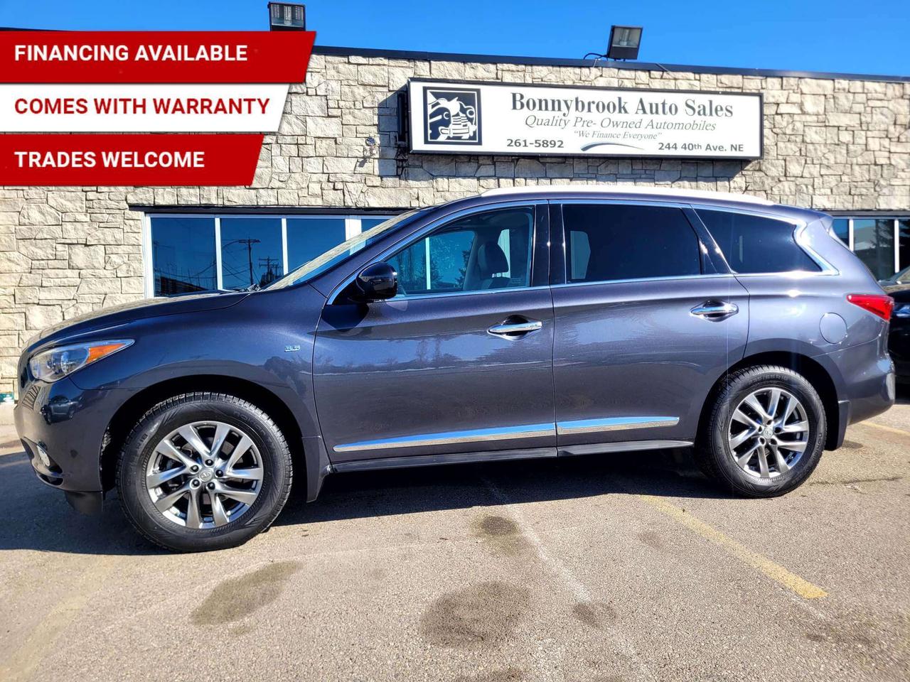Need a vehicle that has style? Look at our Pre-Owned 2014 INFINITI QX60 AWD 7 PASSENGER (Pictured in photo) Filled with top options including Heated Leather Seats, Heated steering wheel, Power Sunroof, Keyless Entry, Remote start, Bluetooth, Navigation, Power Mirrors, Power Locks, Power Windows. Am/Fm stereo Cd player Power sunroof, Rearview camera  Power Lift Gate/Air /Tilt /Cruise/ comes with 6 month power train warranty with options to extend. Smooth ride at a great price thats ready for your test drive. Fully inspected and given a clean bill of health by our technicians. Fully detailed on the interior and exterior so it feels like new to you. There should never be any surprises when buying a used car, thats why we share our Mechanical Fitness Assessment and Carfax with our customers, so you know what we know. Bonnybrook Auto sales is helping thousands find quality used vehicles at prices they can afford. If you would like to book a test drive, have questions about a vehicle or need information on finance rates, give our friendly staff a call today! Bonnybrook auto sales is proudly one of the few car dealerships that have been serving Calgary for over Twenty years. /TRADE INS WELCOMED/ Amvic Licensed Business.  Due to the recent increase for used vehicles.  We are in need of pre-owned vehicles. We give top dollar for your trades.  We also purchase all makes and models of vehicles.