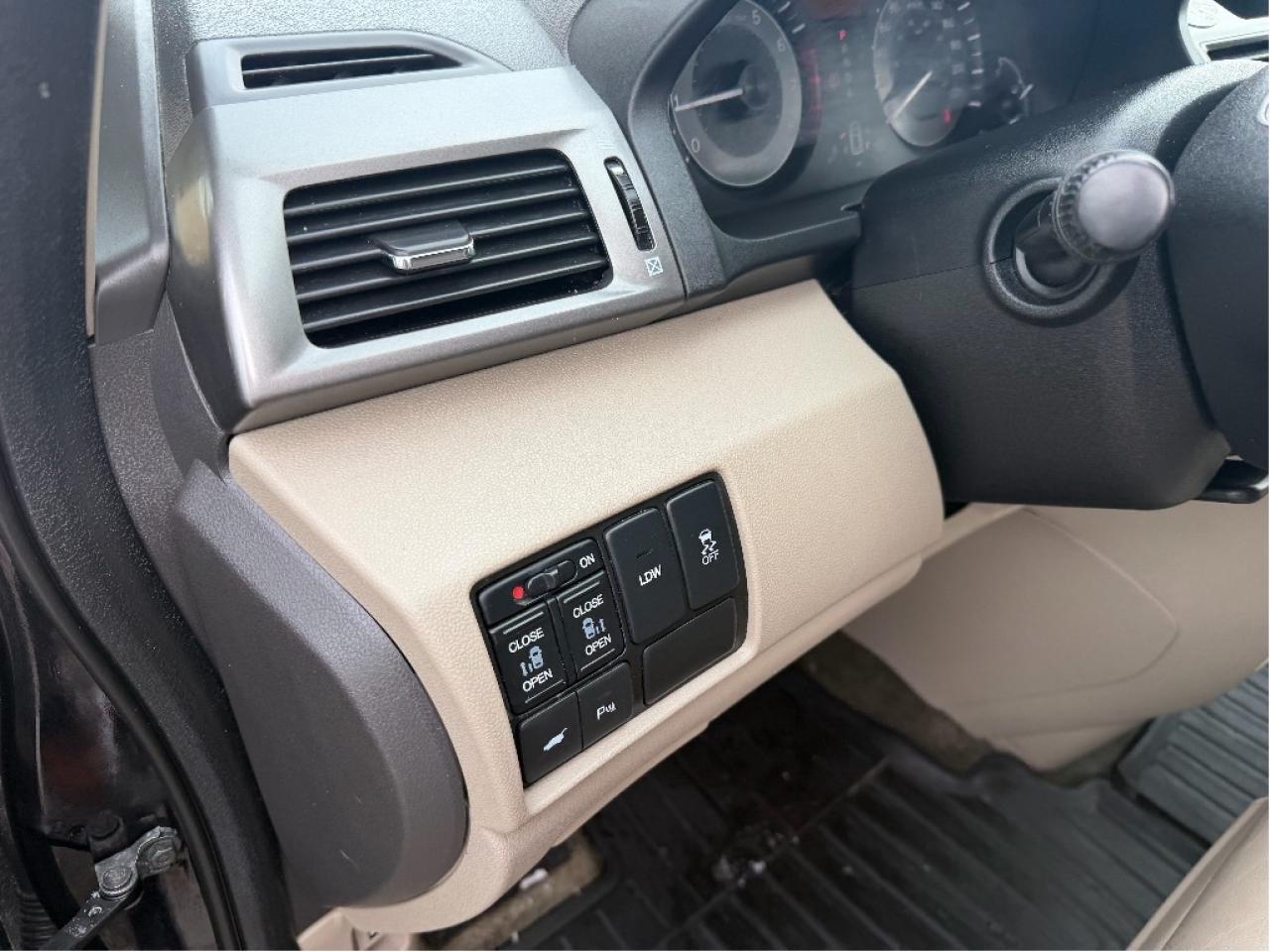 2014 Honda Odyssey Touring | DVD | Two Sets Of Wheels Photo