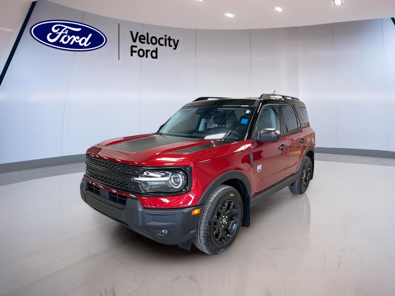 Meet the brand new 2026 Ford Bronco Sport Big Bend 4x4, now available at Velocity Ford in Moose Jaw. Finished in bold red with a clean black interior, this 4-door SUV is built for drivers who want everyday comfort with real 4WD confidence. With a 1.5 L gas engine and an 8-speed automatic transmission, its ready for commutes, weekends, and winter roads.

Inside this 2026 Ford Bronco Sport Big Bend 4x4, youll find smart features that make daily driving easier, from push-button start to automatic climate control. Heated front seats and heated mirrors help you stay comfortable when temperatures drop. Add in tinted windows and ambient lighting, and you get a cabin that feels modern and welcoming without being complicated.

On the road, this 2026 Ford Bronco Sport Big Bend 4x4 keeps things calm and controlled. Cruise control supports relaxed highway driving, while stability control and anti-lock braking help you stay composed on slick or uneven surfaces. A backup camera and automatic headlights add extra confidence when visibility changes or parking gets tight.

FEATURES OF THE Bronco Sport Big Bend 4x4  
»» Four-wheel drive for year-round traction  
»» 1.5 L gas engine power  
»» 8-speed automatic transmission for smooth shifts  
»» Red exterior with black interior  

ADVANCED SAFETY FEATURES  
»» Anti-lock braking system for controlled stops  
»» Stability control helps maintain road grip  
»» Blind spot monitor for safer lane changes  
»» Lane departure warning adds driving confidence  

PERFORMANCE AND EFFICIENCY  
»» 1.5 L gas engine for daily use  
»» Automatic transmission with 8-speed operation  
»» Four-wheel drive for confident winter travel  
»» Power steering for easy low-speed control  

COMFORT AND CONVENIENCE  
»» Automatic climate control maintains set temperature  
»» Heated front seats for cold mornings  
»» Power windows for quick ventilation control  
»» Push button start for easy departures  

TECHNONOLGY AND CONNECTIVITY  
»» Bluetooth integration for hands-free calling  
»» Steering wheel audio controls for convenience  
»» WiFi hotspot capability for connected travel  
»» Satellite radio for more listening choice  

CARGO SPACE  
»» Rear trunk access for easy loading  
»» Four-door layout aids passenger entry  
»» Practical SUV cargo area versatility  
»» Room for daily gear and groceries  

WHAT OTHER OWNERS LIKE  
»» Confident feel from four-wheel drive  
»» Easy-to-use infotainment and Bluetooth pairing  
»» Helpful driver aids for daily commuting  
»» Comfortable ride with simple controls  

This 2026 Ford Bronco Sport Big Bend 4x4s VIN is: 3FMCR9BNXTRE10840.