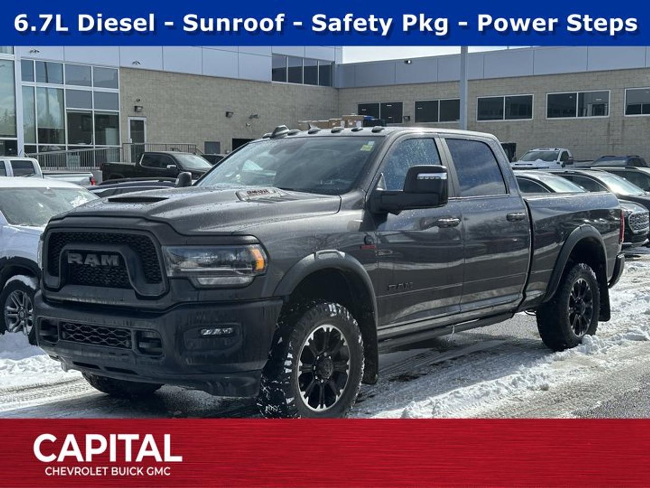 Look at this 2024 Ram 2500 Rebel. Its Automatic transmission and Intercooled Turbo Diesel I-6 6.7 L/408 engine will keep you going. This Ram 2500 features the following options: SECURITY ALARM, RADIO: UCONNECT 5 NAV W/12.0 DISPLAY, POWER SUNROOF, POWER DEPLOYABLE RUNNING BOARDS, MOPAR FRONT & REAR ALL-WEATHER FLOOR MATS, MONOTONE PAINT, GRANITE CRYSTAL METALLIC, CENTRE STOP LAMP W/CARGO CAMERA, BLIND-SPOT/CROSS-PATH, and ADAPTIVE STEERING SYSTEM. Test drive this vehicle at Capital Chevrolet Buick GMC Inc., 13103 Lake Fraser Drive SE, Calgary, AB T2J 3H5.