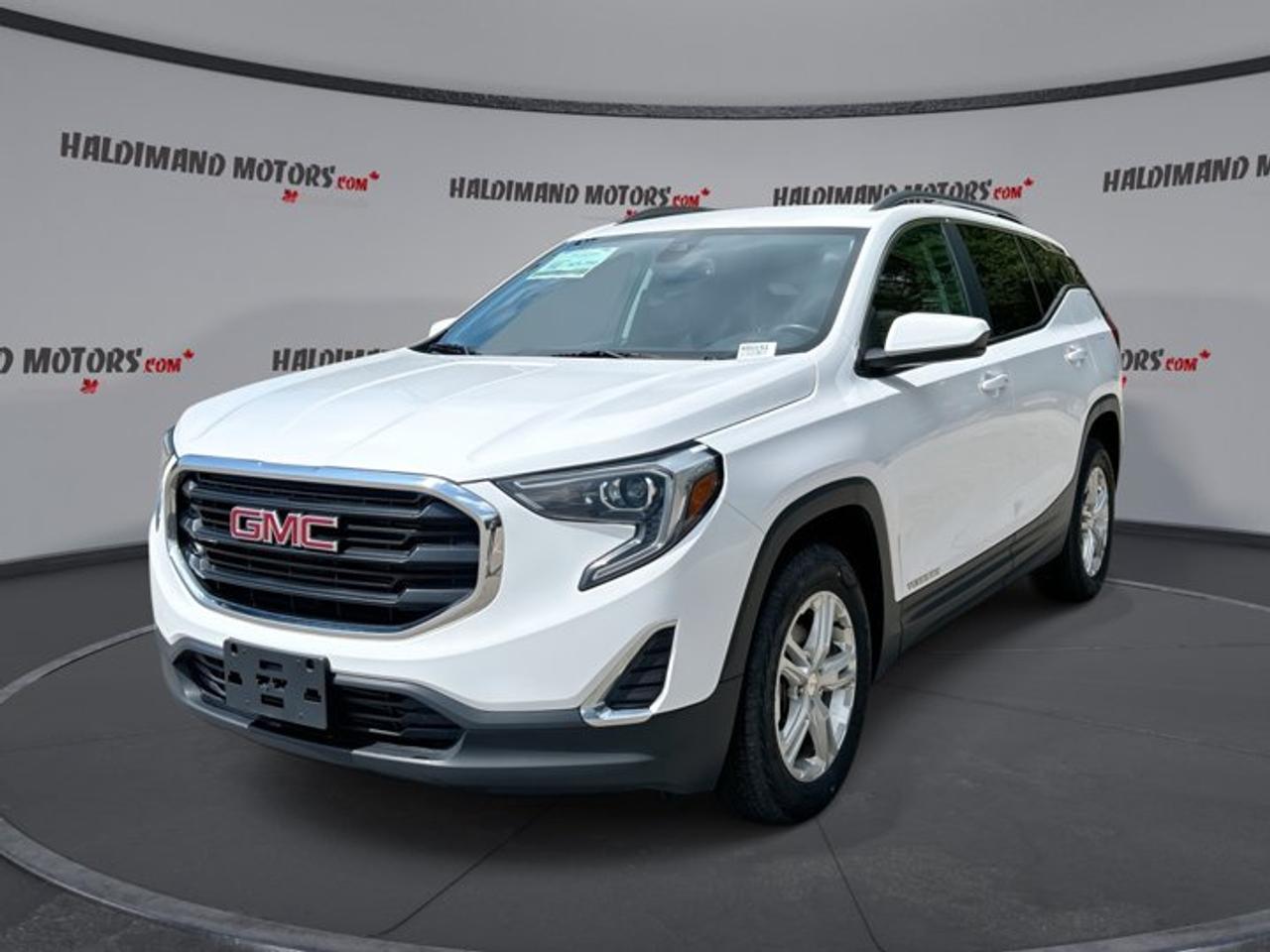 // ACCIDENT FREE!! //<br /><br />At Haldimand Motors Ltd. in Cayuga, this used 2021 GMC Terrain SLE AWD is a smart pick for drivers who want year-round confidence, modern tech, and everyday comfort. Finished in white with a black interior, it has 4 doors, an automatic transmission, and a 1.5 L gas engine. With 103,247 km, its ready for more commutes, errands, and road trips. The 2021 GMC Terrain SLE AWD also adds remote start, so you can warm it up or cool it down before you climb in.<br /><br />This Terrain is built for real Canadian driving. The all-wheel drive system helps you stay composed when roads are wet, snowy, or uneven. You also get a strong mix of safety and driver-assist features, plus easy smartphone integration for daily convenience. The 2021 GMC Terrain SLE AWD keeps things simple and user-friendly, with controls that are easy to learn and features that make sense for busy life.<br /><br />FEATURES OF THE Terrain SLE AWD | No accidents | Remote Start<br />   All-wheel drive for confident traction <br />   Remote start for easier temperature comfort <br />   Apple CarPlay and Android Auto <br />   Heated front seats for cold days <br /><br />ADVANCED SAFETY FEATURES<br />   Anti-lock braking system for controlled stops <br />   Stability control helps maintain steady handling <br />   Lane departure warning for added awareness <br />   Backup camera for easier reversing <br /><br />PERFORMANCE AND EFFICIENCY<br />   1.5 L gas engine for daily driving <br />   Automatic transmission with dual shift mode <br />   All-wheel drive for four-season capability <br />   Tire pressure monitoring helps reduce wear <br /><br />COMFORT AND CONVENIENCE<br />   Heated front seats for winter comfort <br />   Dual-zone automatic climate control included <br />   Driver lumbar support for longer drives <br />   Driver side power seat adjustment <br /><br />TECHNONOLGY AND CONNECTIVITY<br />   Bluetooth integration for hands-free calling <br />   Apple CarPlay for familiar app access <br />   Android Auto for simple navigation use <br />   WiFi hotspot for connected passengers <br /><br />CARGO SPACE<br />   Rear trunk access for quick loading <br />   Four-door layout eases passenger entry <br />   Spare tire included for peace of mind <br />   Tinted windows add comfort and privacy <br /><br />WHAT OTHER OWNERS LIKE<br />   Confident feel from all-wheel drive <br />   Easy-to-use phone integration features <br />   Comfortable ride for daily commuting <br />   Helpful driver-assist safety technology <br /><br />This 2021 GMC Terrain SLE AWD | No accidents | Remote Starts VIN is: 3GKALTEV6ML306229.<br /><br />WHY CHOOSE US? <br /><br />Honest & Transparent Buying Experience: Weve been a trusted name in business since 1984.<br /><br />STRAIGHTFORWARD PRICING:<br />Our Advertised Price Includes:<br />>>Safety Certification (No separate fee!)<br />>>30-Day 100% Mechanical Warranty<br />>>FREE Carfax History Report.<br />>>No upcharge for paying cash.<br />(Prices Exclude HST and Licensing Fees only.)<br /><br />>>Browse 300+ vehicles all in ONE LOCATION<br /><br />EASY FINANCING: Great rates & open loans<br /><br />WE BUY CARS: Get Top Dollar for your trade-in, or sell us your vehicle for CASH! Even if you dont buy from us!<br /><br />STOP BY TODAY<br />Treat yourself - stop by Haldimand Motors Ltd. located at 42 Talbot St E, Cayuga, ON N0A 1E0 to make this car yours today!<br /><br />https://www.haldimandmotors.com/used/stock-460151.html