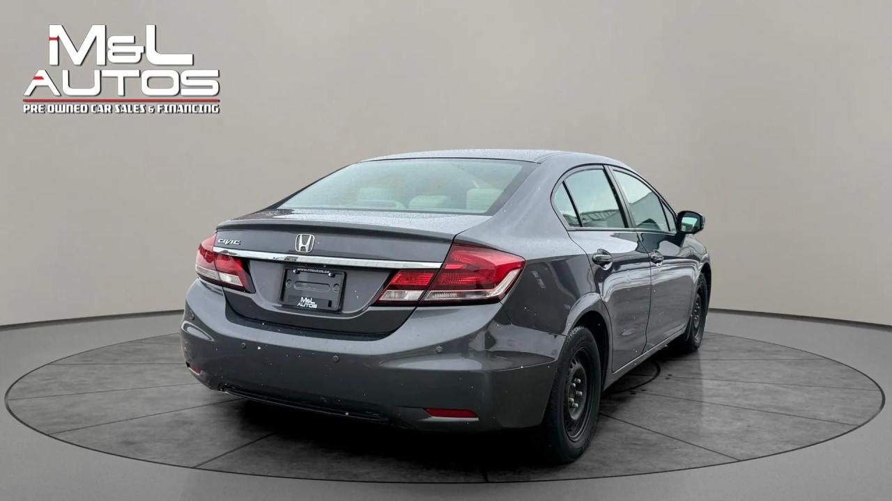 2013 Honda Civic 4dr Auto LX Photo