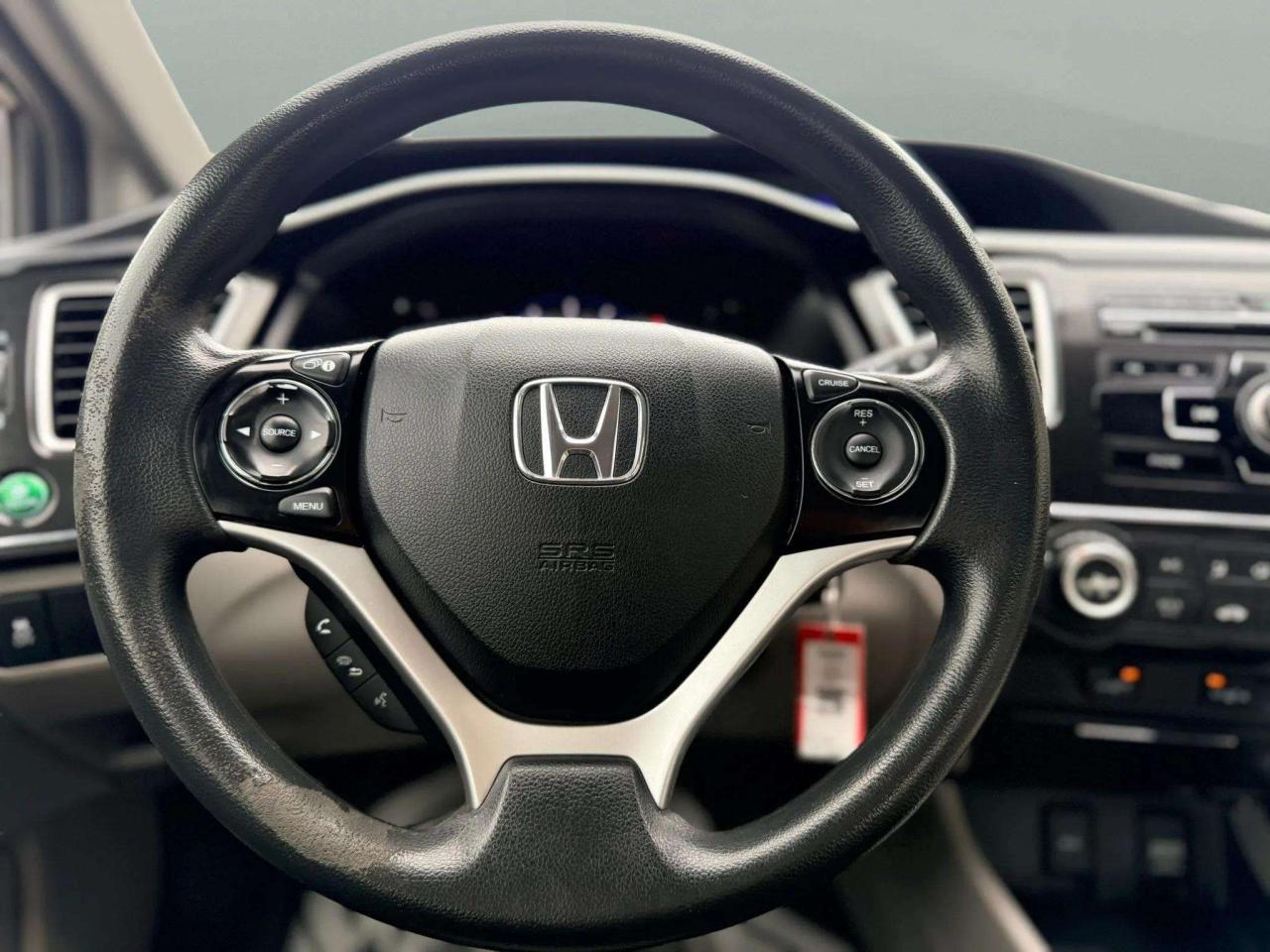 2013 Honda Civic 4dr Auto LX Photo