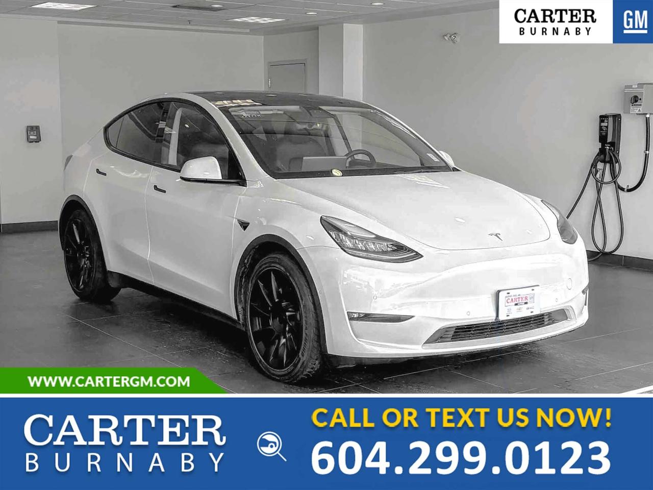 Experience the perfect balance of performance, technology, and style in this 2021 Tesla Model Y Long Range AWD. Powered by a dual-motor all-wheel-drive system, it delivers confident handling and impressive efficiency. Enjoy premium features like navigation, park assist, power seats, power liftgate, 15-speaker audio, and a heated steering wheel. Advanced safety highlights include Blind Spot Monitoring, collision mitigation, rear collision warning, driver alerts, and multiple cameras.

Come take it for a test drive today and experience all this stylish vehicle has to offer!

WHY CARTER GM BURNABY?

- An unrivalled vehicle purchasing experience!
- Exceeding our loyal customers expectations since 1963
- 4.5 Google star rating (with 2,300+ customer reviews)
- Cargurus Top-rated Dealer 2025 Award
- Cargurus Top Value Dealer 2025 Award
- Peace of mind - 150-point vehicle inspection
- CARFAX - full vehicle service history - purchase with confidence!
- Vehicle trades welcome! Best price guaranteed!
- We provide upfront pricing, zero hidden fees, and 100% transparency
- Fast approvals and 99% acceptance rates (no matter your current credit status!)
- Multilingual staff (many languages spoken)
- Comfortable non-pressured environment with in-store television, WIFI and a childrens play area!
- In-store restaurant: fresh daily menu





Were here to help you drive the vehicle you want, the vehicle you deserve!
QUESTIONS? GREAT! WEVE GOT ANSWERS!
To speak with a friendly vehicle specialist - CALL NOW!
The advertised price includes all standard dealer fees and any applicable manufacturer or dealer incentives. It does not include applicable taxes, licensing, insurance, or optional products or services. Dealer fees will be clearly broken out and itemized on the bill of sale, maximum total of fees $495.00. Prices are shown in Canadian dollars. While we make every effort to ensure accuracy, vehicle details, pricing, options, and availability are subject to change without notice. Please confirm all information with dealership sales management before purchase. Dealer Code: 81129