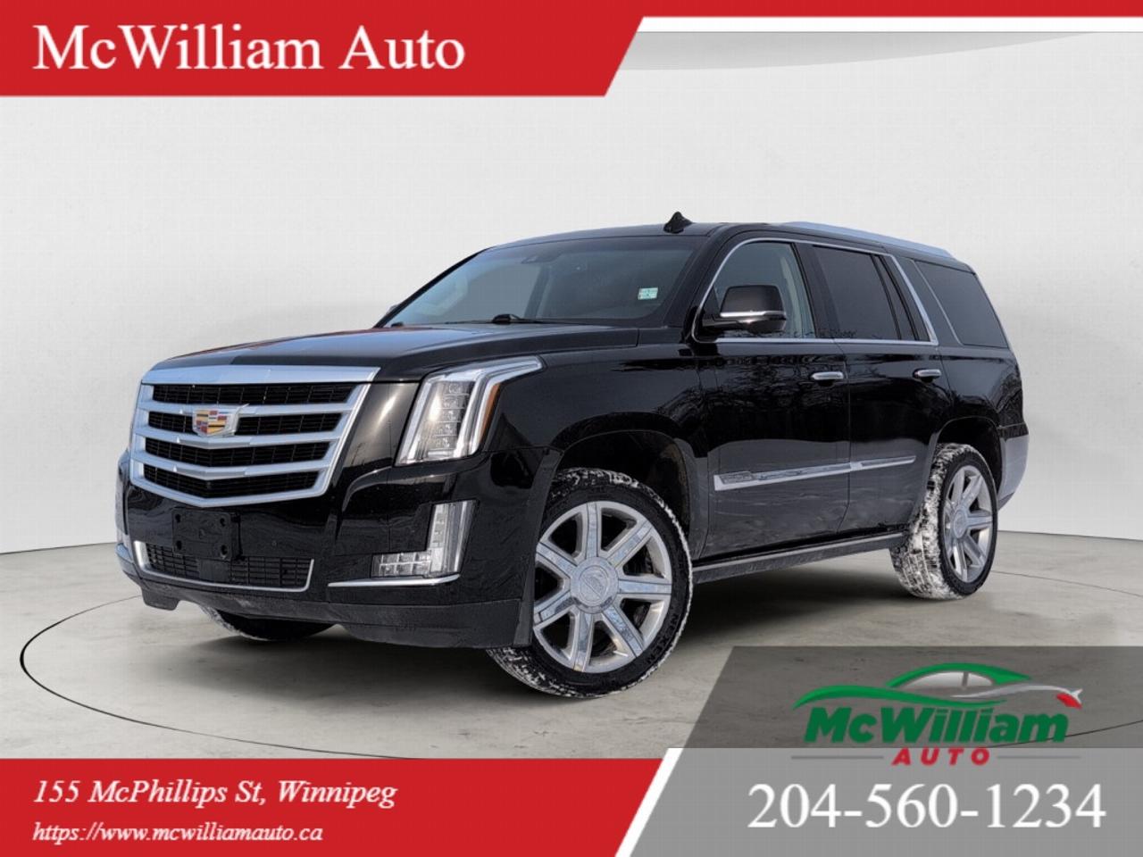 <br> This black 2016 Cadillac Escalade Premium Collection delivers full-size luxury, commanding presence, and advanced technology in one of the most sought-after premium SUVs on the market. With bold styling, a powerful V8 engine, and an exceptionally refined interior, this Escalade represents Cadillac craftsmanship at its finest.Under the hood, the Escalade Premium Collection is powered by a 6.2L V8 engine producing 420 horsepower and 460 lb-ft of torque, paired with an 8-speed automatic transmission for smooth, confident performance. Magnetic Ride Control adaptive dampers continuously adjust suspension settings for optimal comfort and handling, while advanced driver assistance systems including Adaptive Cruise Control (ACC), Blind Spot Monitoring (BSM), and Lane Keep Assist (LKAS) enhance safety and confidence on the road.The exterior is equipped with power-deployable running boards, full LED lighting, 22-inch premium wheels, and a hands-free power liftgate. A 360-degree surround vision camera system provides exceptional visibility when maneuvering in tight spaces.Inside, the cabin is finished with open-pore wood grain inlays and premium leather seating surfaces, offering both sophistication and comfort. Heated and ventilated front seats, heated second-row seats, and a heated steering wheel ensure year-round comfort. Memory seating, power-adjustable pedals, keyless entry, and remote start provide everyday convenience. A full-color Head-Up Display projects key driving information directly onto the windshield.Technology is a standout feature, highlighted by Cadillacs CUE infotainment system with navigation, Bluetooth connectivity, Apple CarPlay capability, and a Bose 16-speaker premium surround sound system for an immersive audio experience. Rear passengers are treated to a factory rear DVD entertainment system, making long drives enjoyable for everyone.Additional standard and premium features include tri-zone automatic climate control, power folding third-row seating, power tilt and telescoping steering column, wireless charging capability, multiple USB ports, and advanced airbag and stability control systems.<br><br> This 2016 Cadillac Escalade Premium Collection blends luxury, power, and advanced safety technology into a full-size SUV that continues to set the benchmark in its class. It is an exceptional choice for buyers seeking premium comfort, strong towing capability, and unmistakable road presence.<br><br> IMPORTANT DISCLAIMER : This vehicle is a used vehicle, all the features and information may not be accurate from the descriptions above, please check the