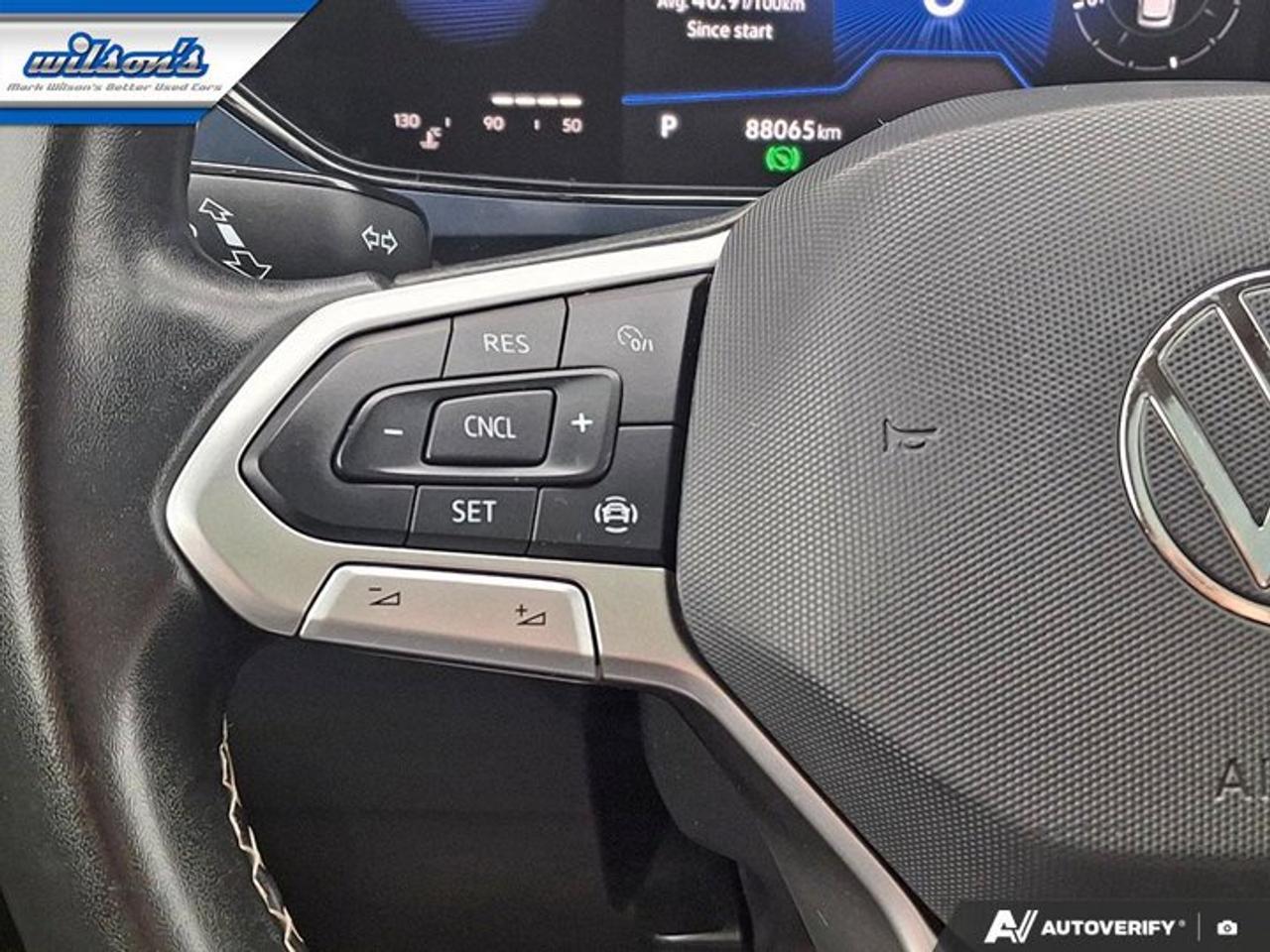 2022 Volkswagen Taos Comfortline AWD | Sunroof | Power Seat | Heated Seats | BSM | CarPlay + Android | Rear Cam and More! Photo