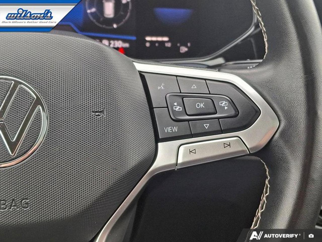 2022 Volkswagen Taos Comfortline AWD | Sunroof | Power Seat | Heated Seats | BSM | CarPlay + Android | Rear Cam and More! Photo